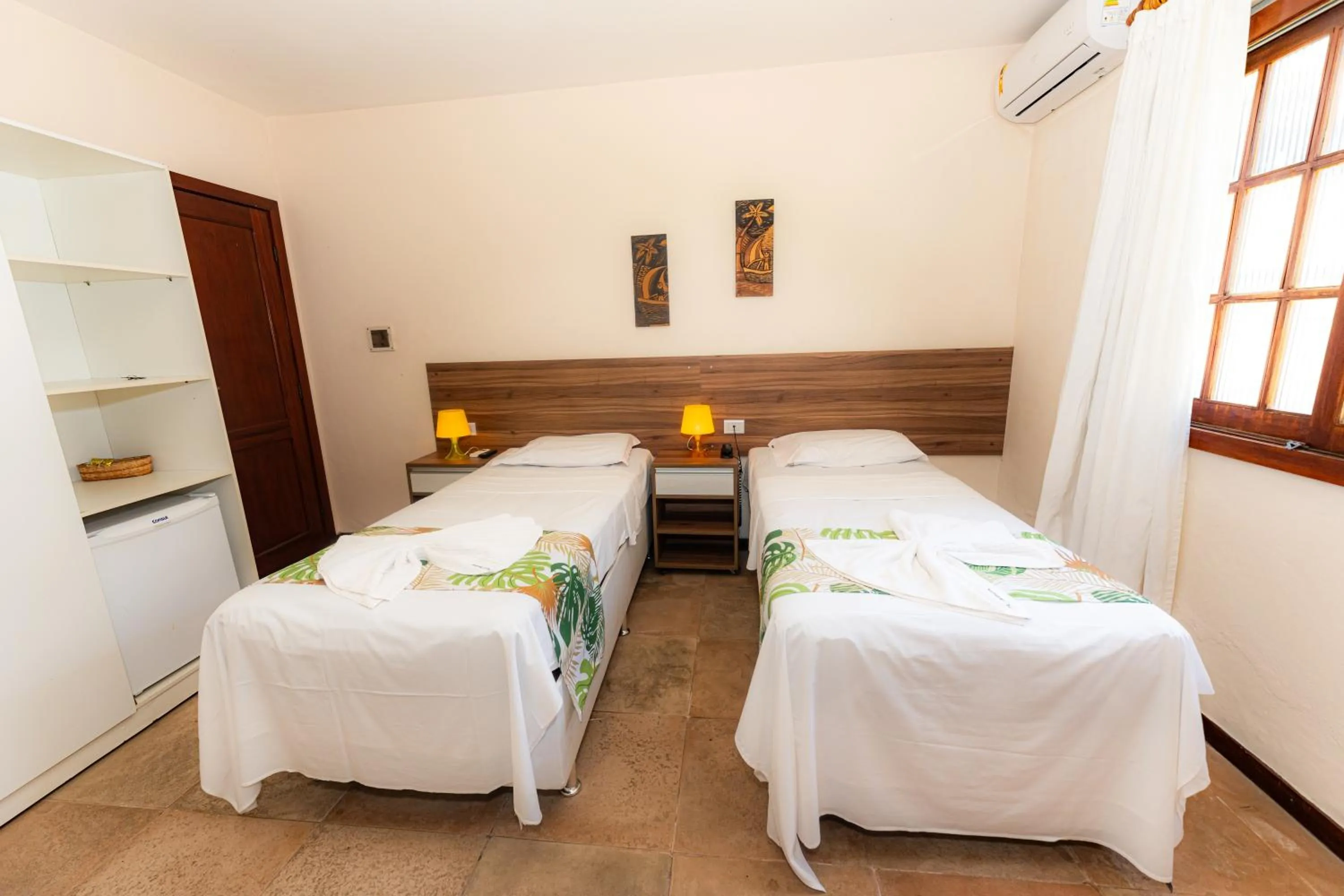 Bed in Hotel Pousada Salvador Paradise