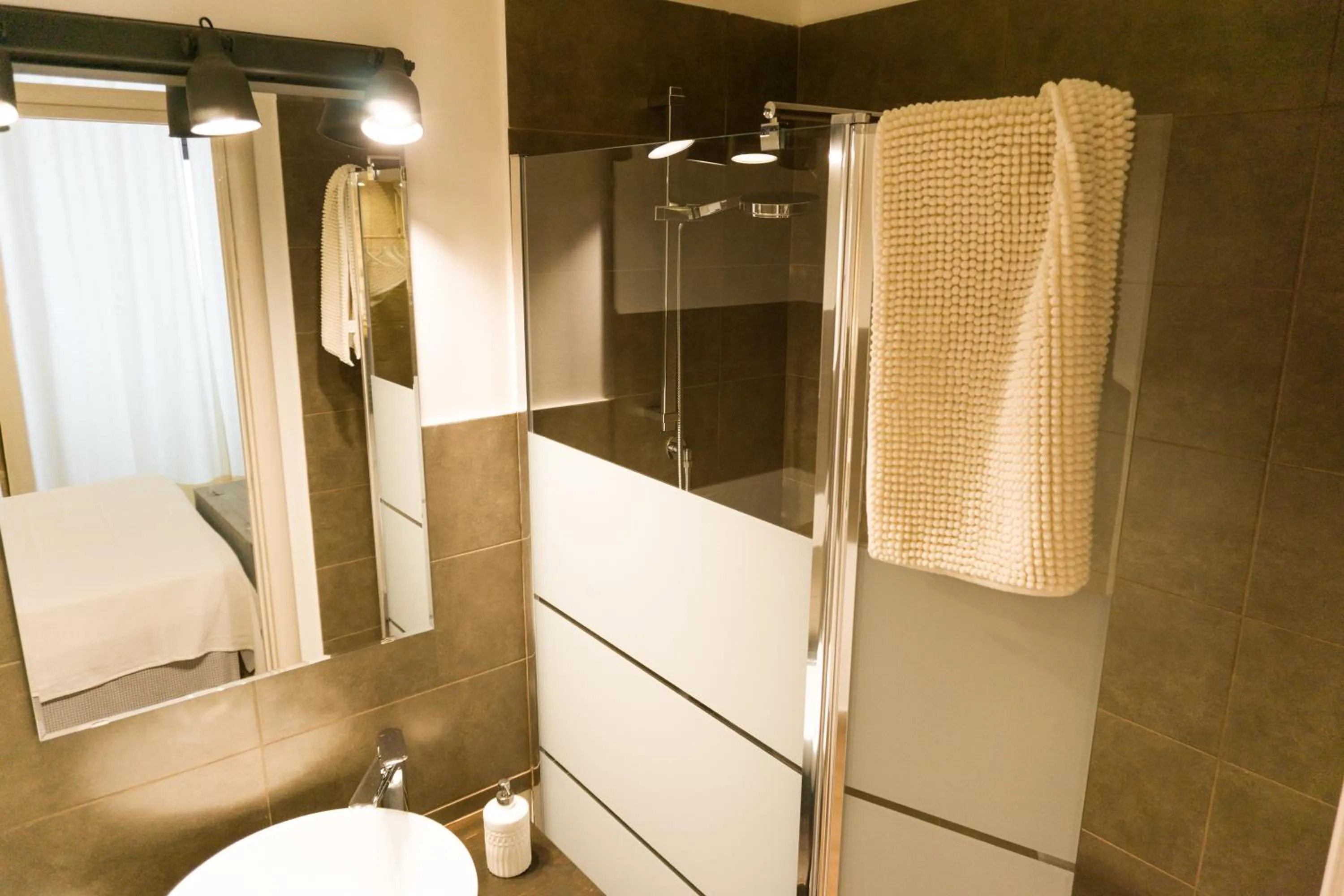 Bathroom in Donato Rooms