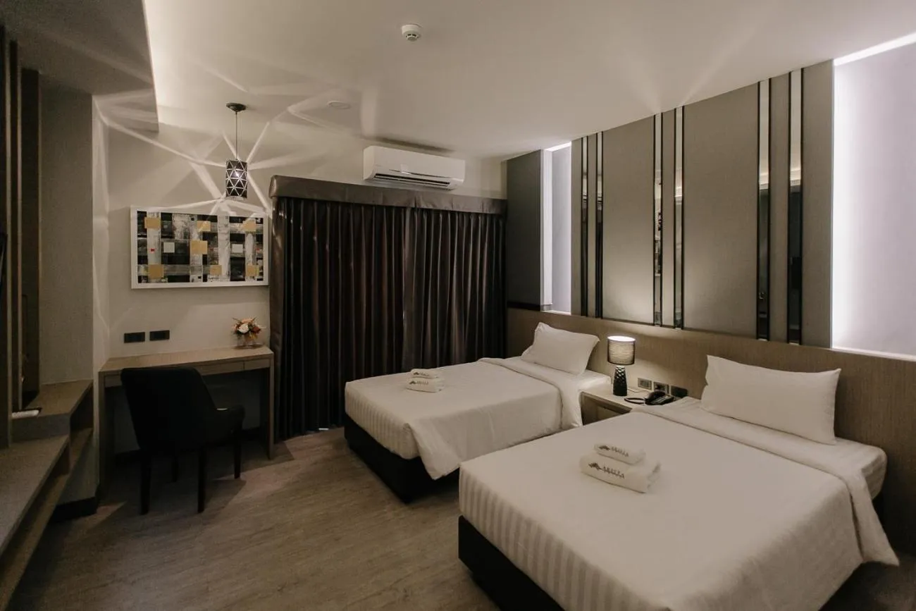 Bed in Arista Hotel Ubon