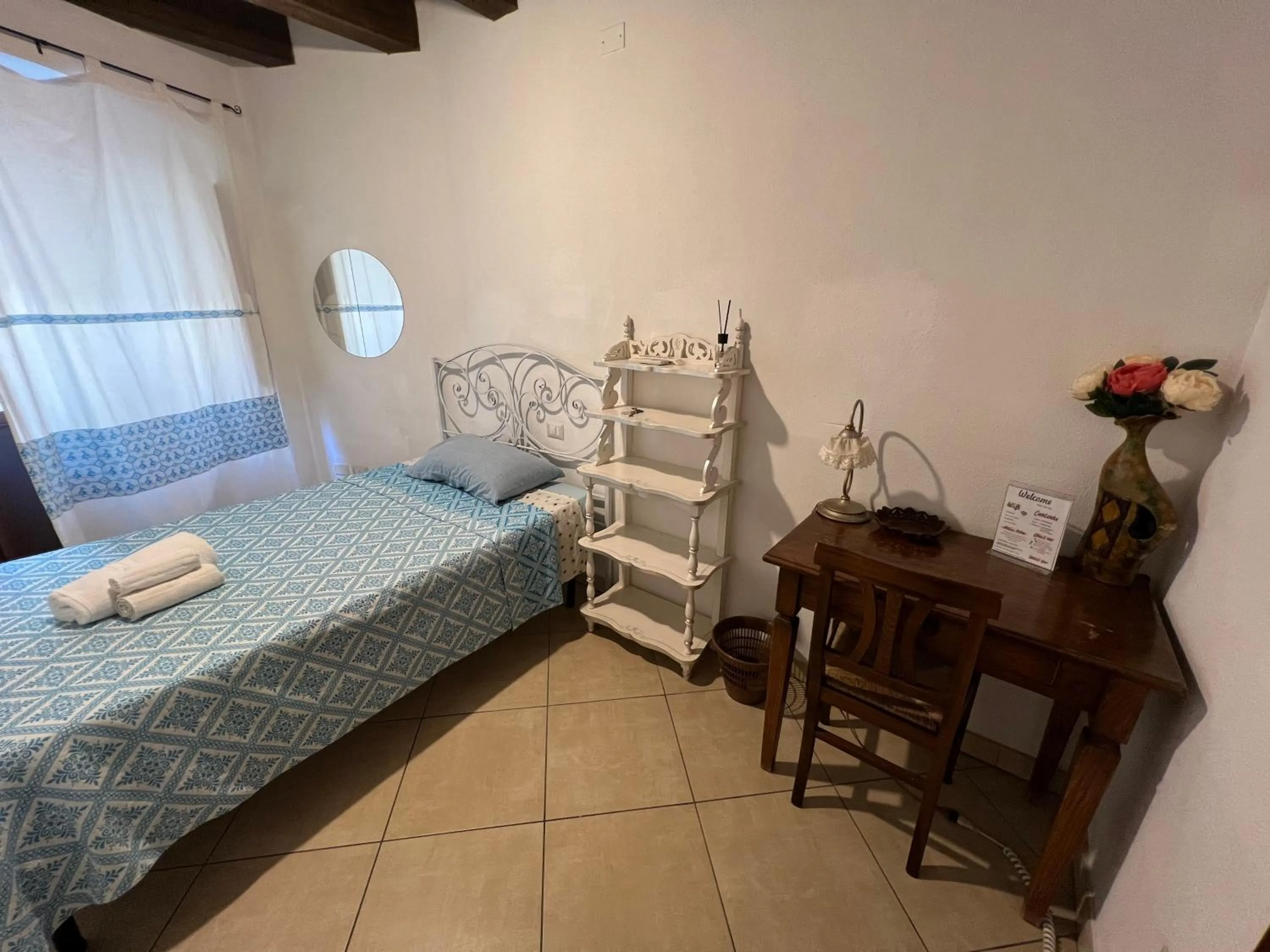 Bed in L'Antica Torre Caralis Holiday