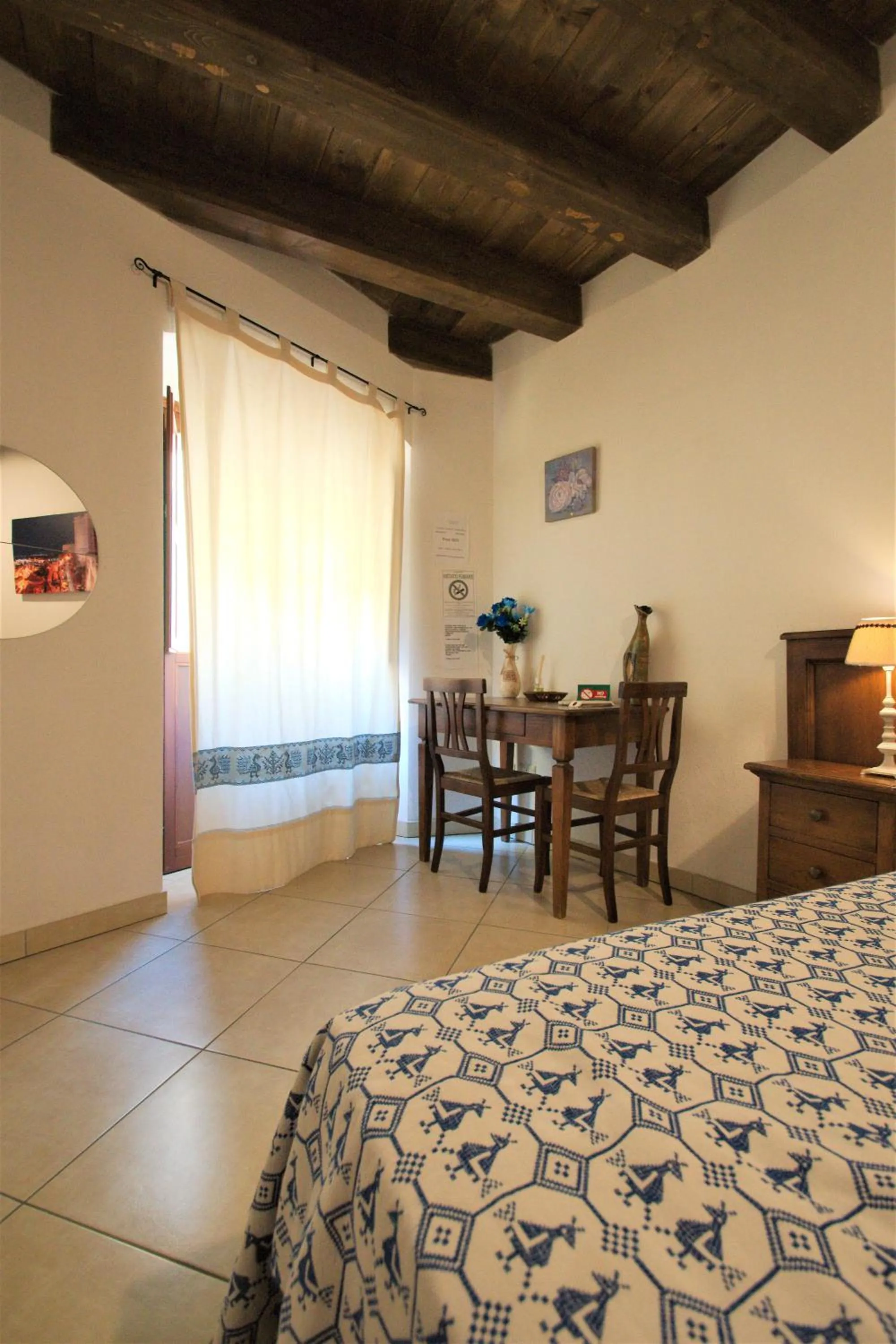 Seating area, Bed in L'Antica Torre Caralis Holiday