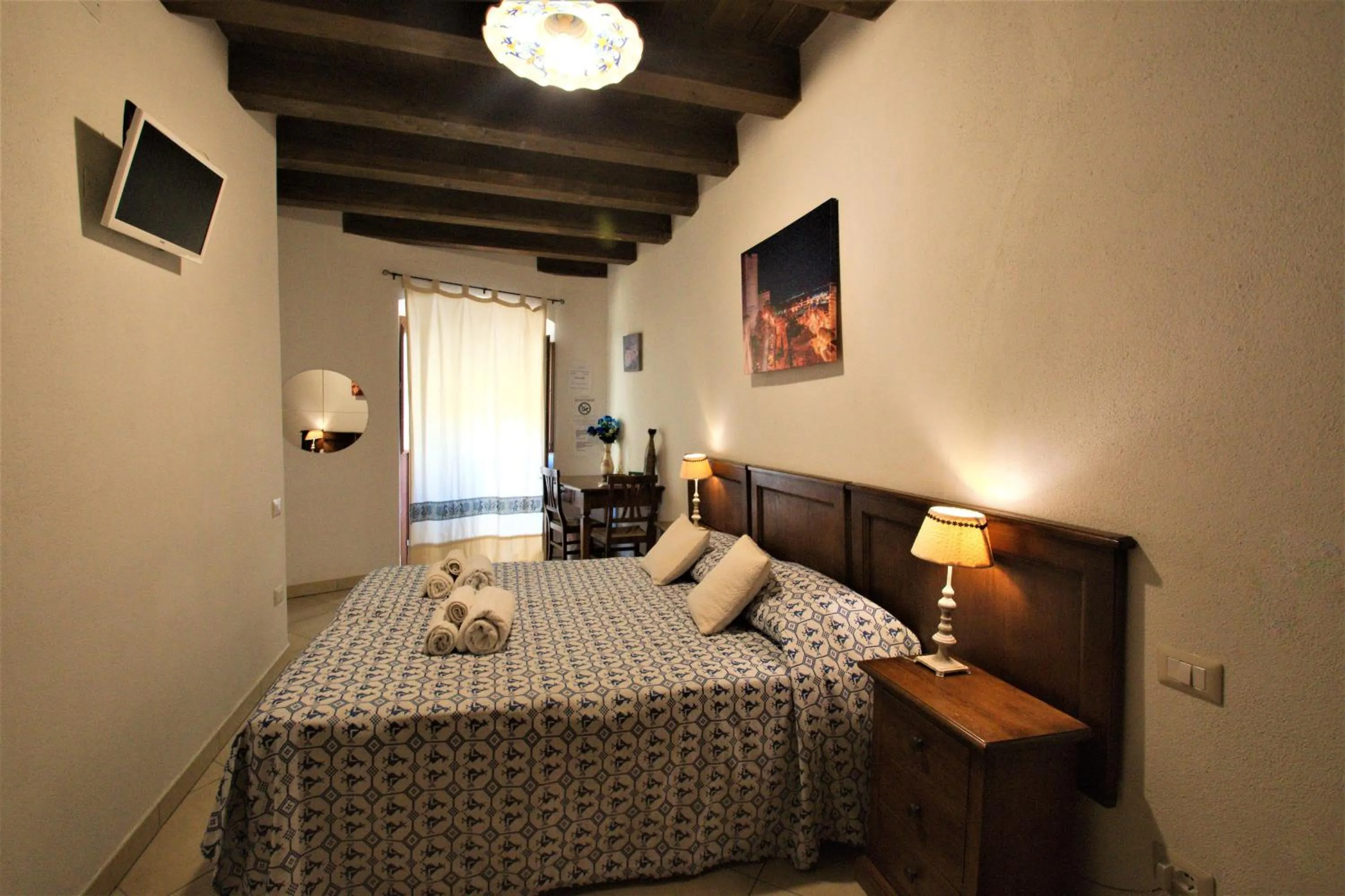 Bed in L'Antica Torre Caralis Holiday