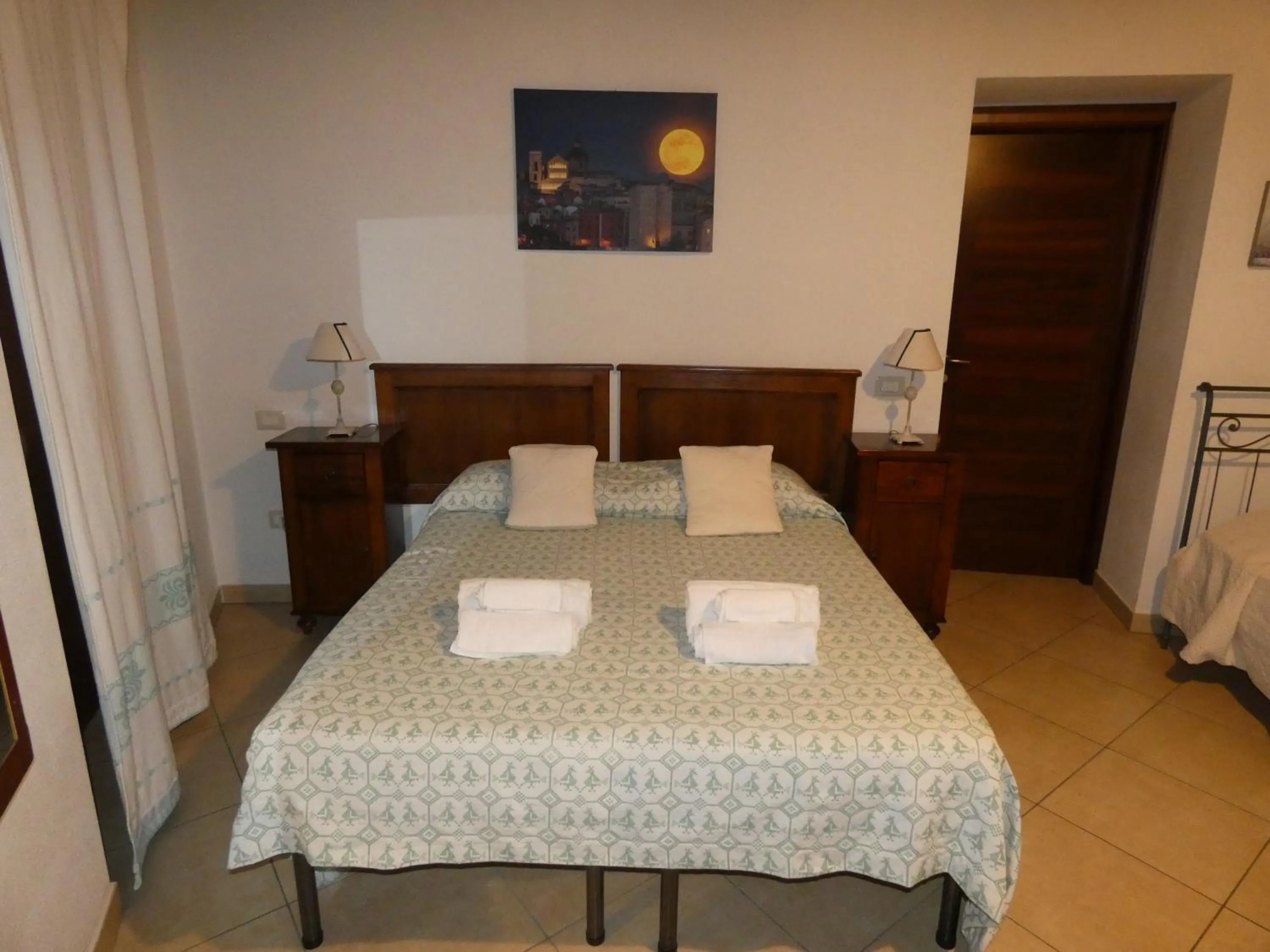 Bed in L'Antica Torre Caralis Holiday