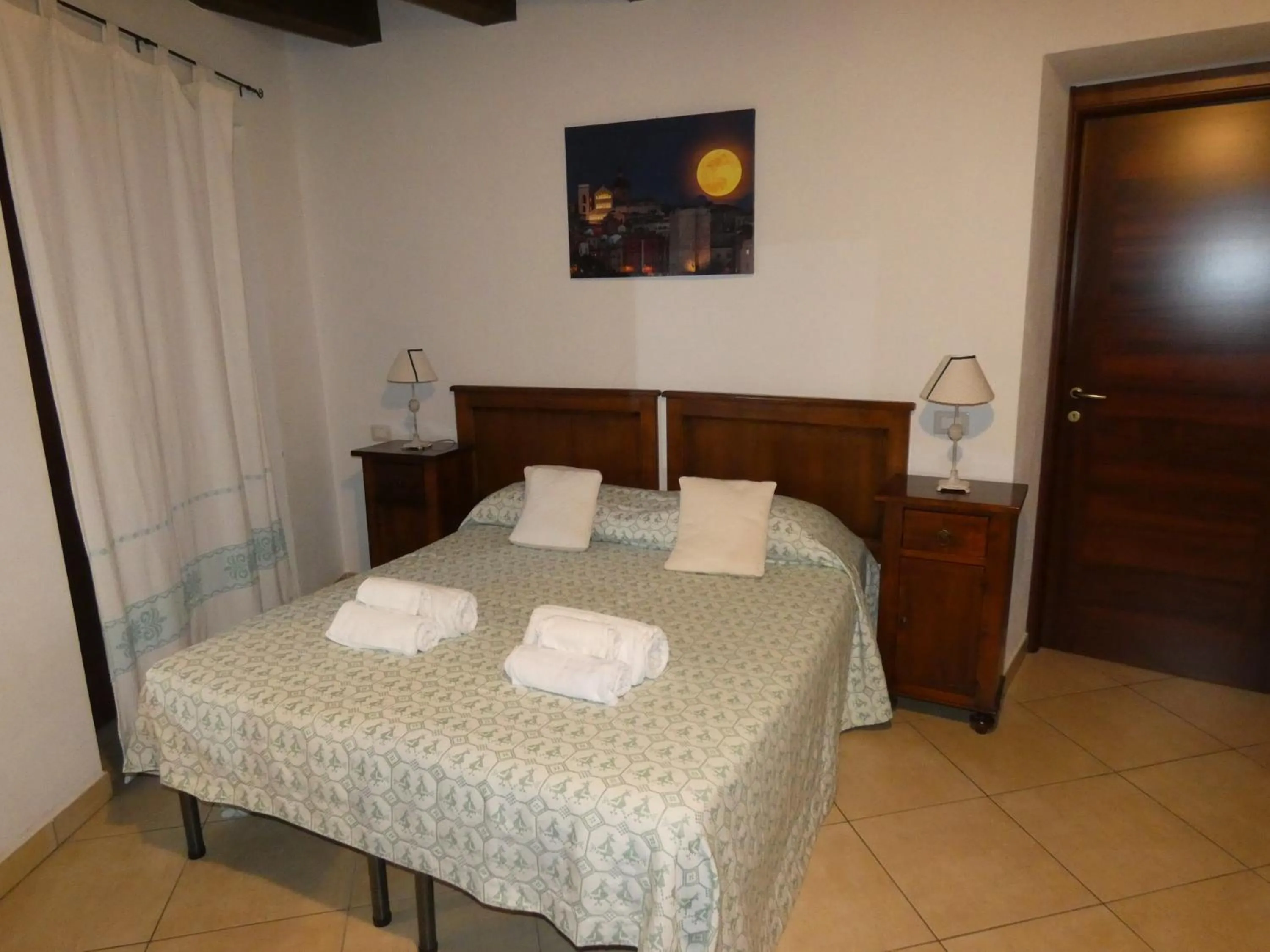 Bed in L'Antica Torre Caralis Holiday
