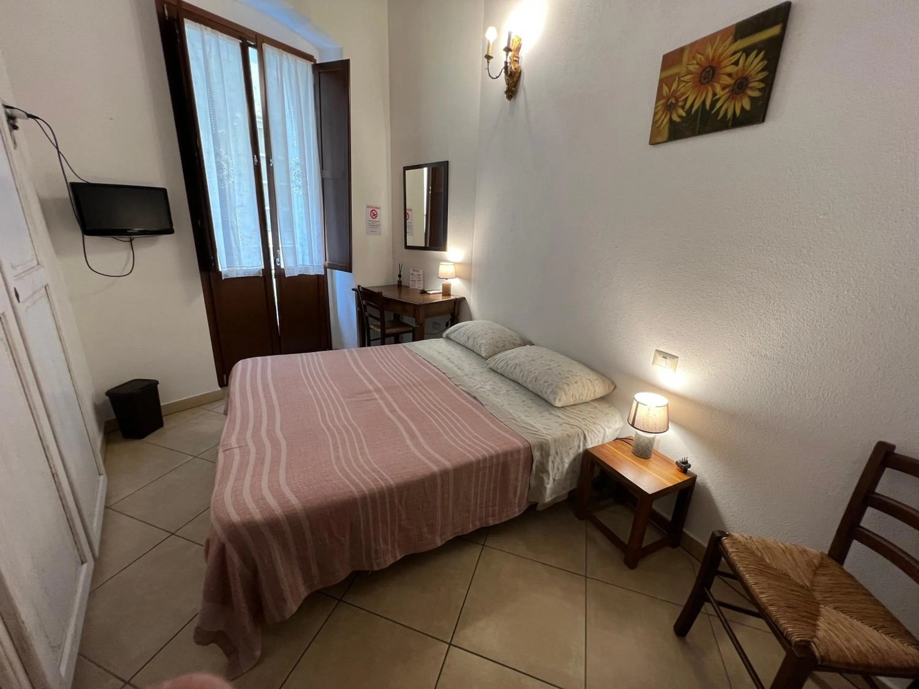 Bed in L'Antica Torre Caralis Holiday