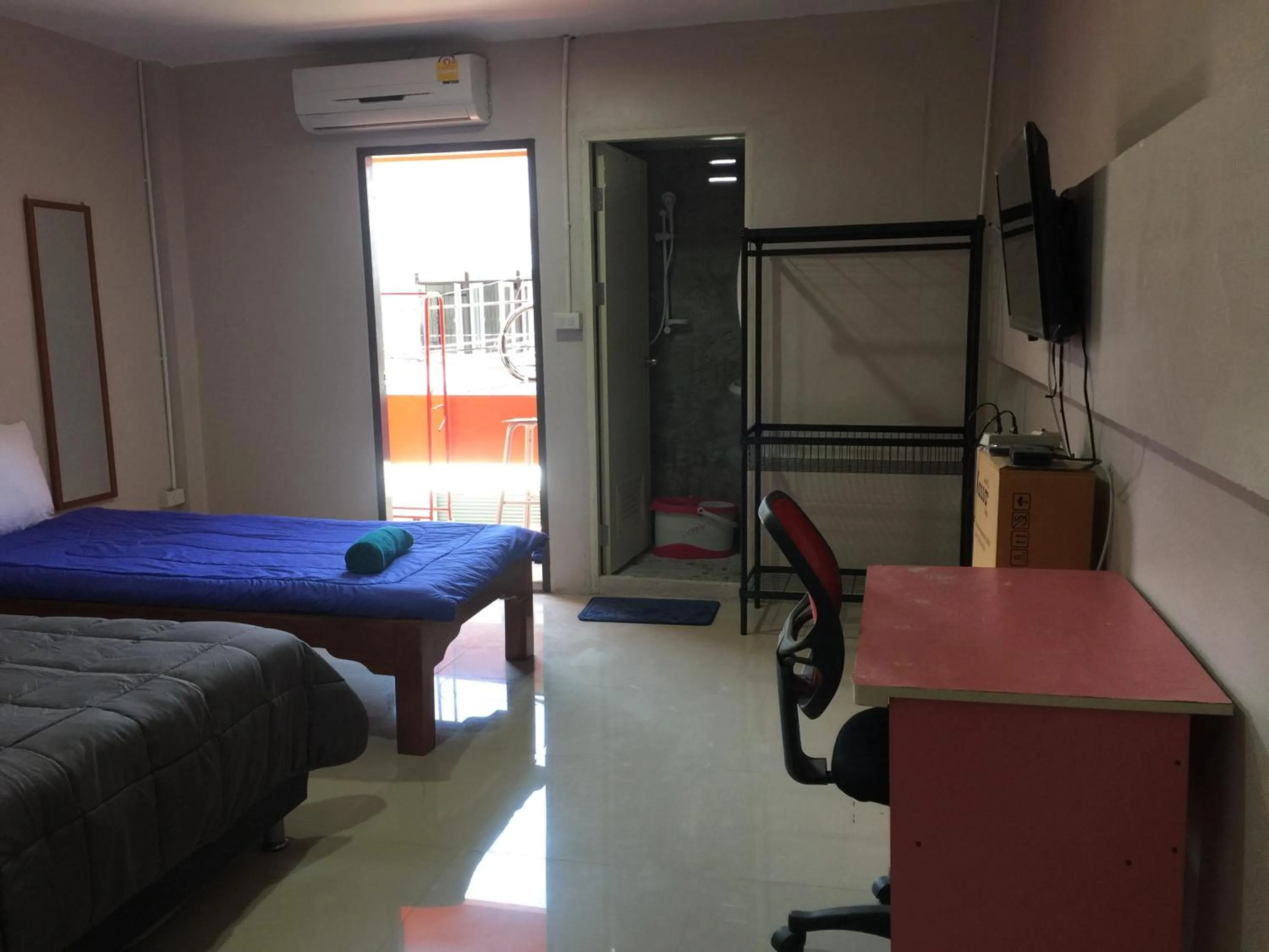 Bed in SMILE HOME GUESTHOUSE