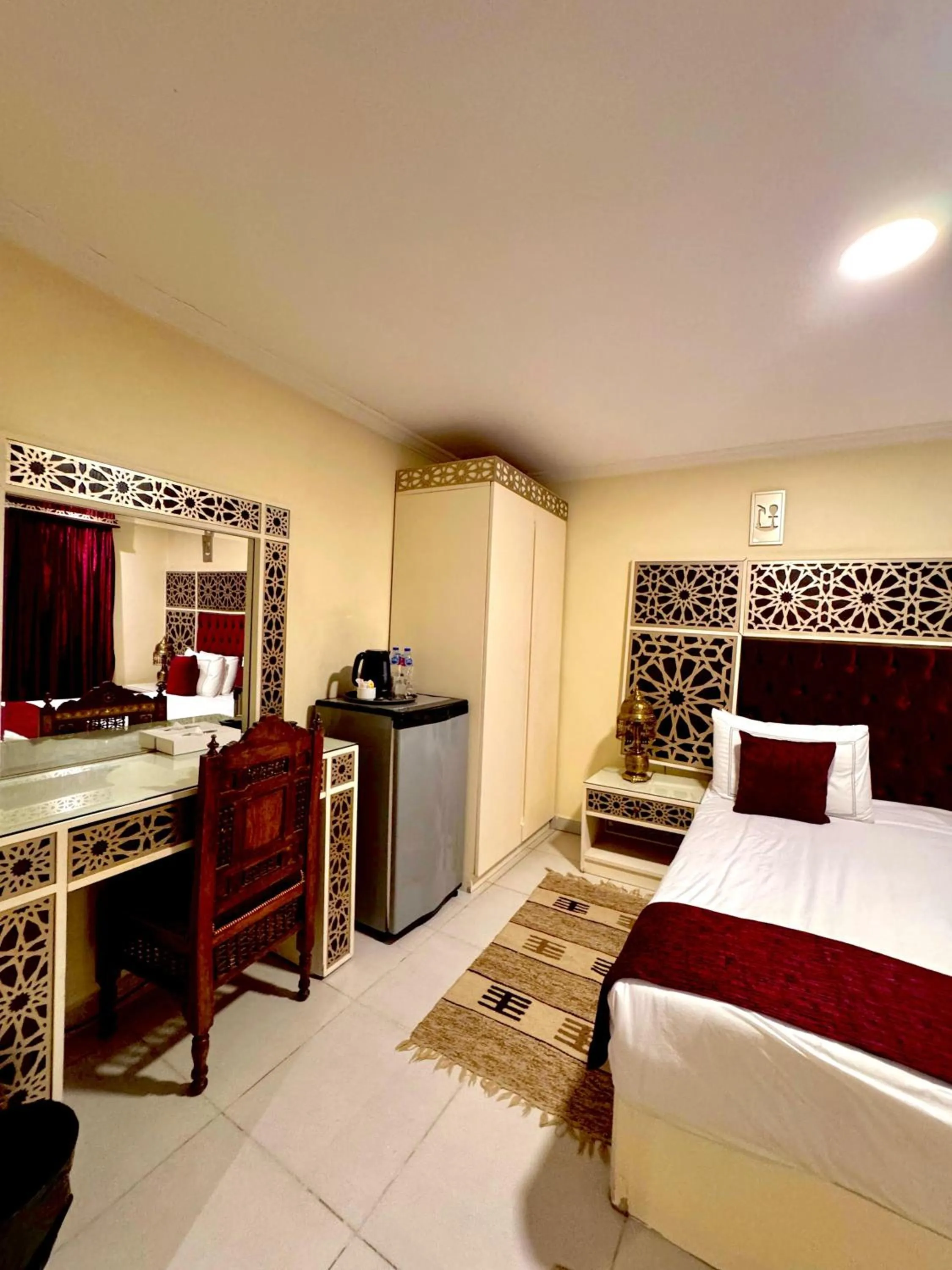 Bed in PYRAMIDS TOWER Inn