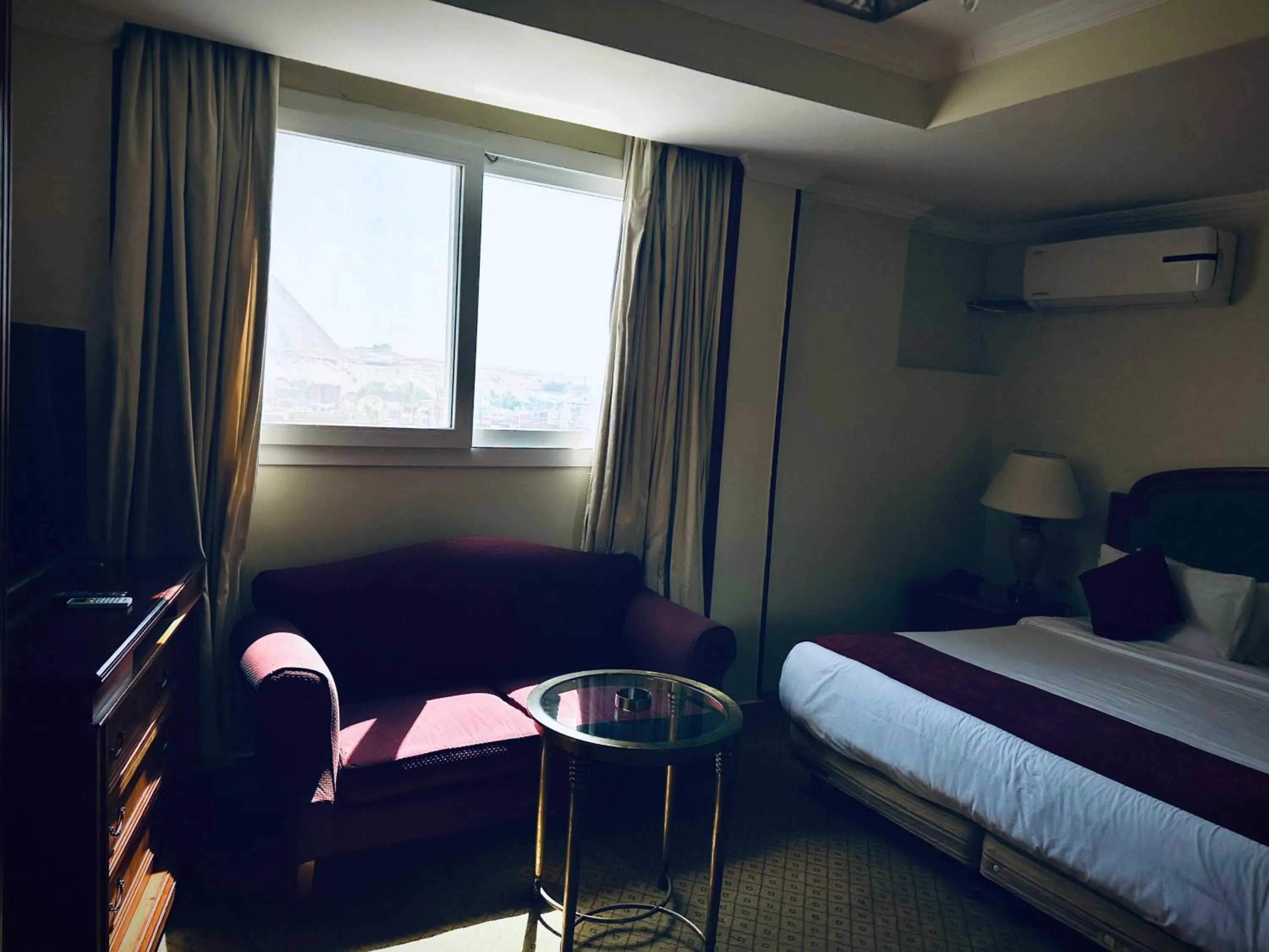 Bed in PYRAMIDS TOWER Inn