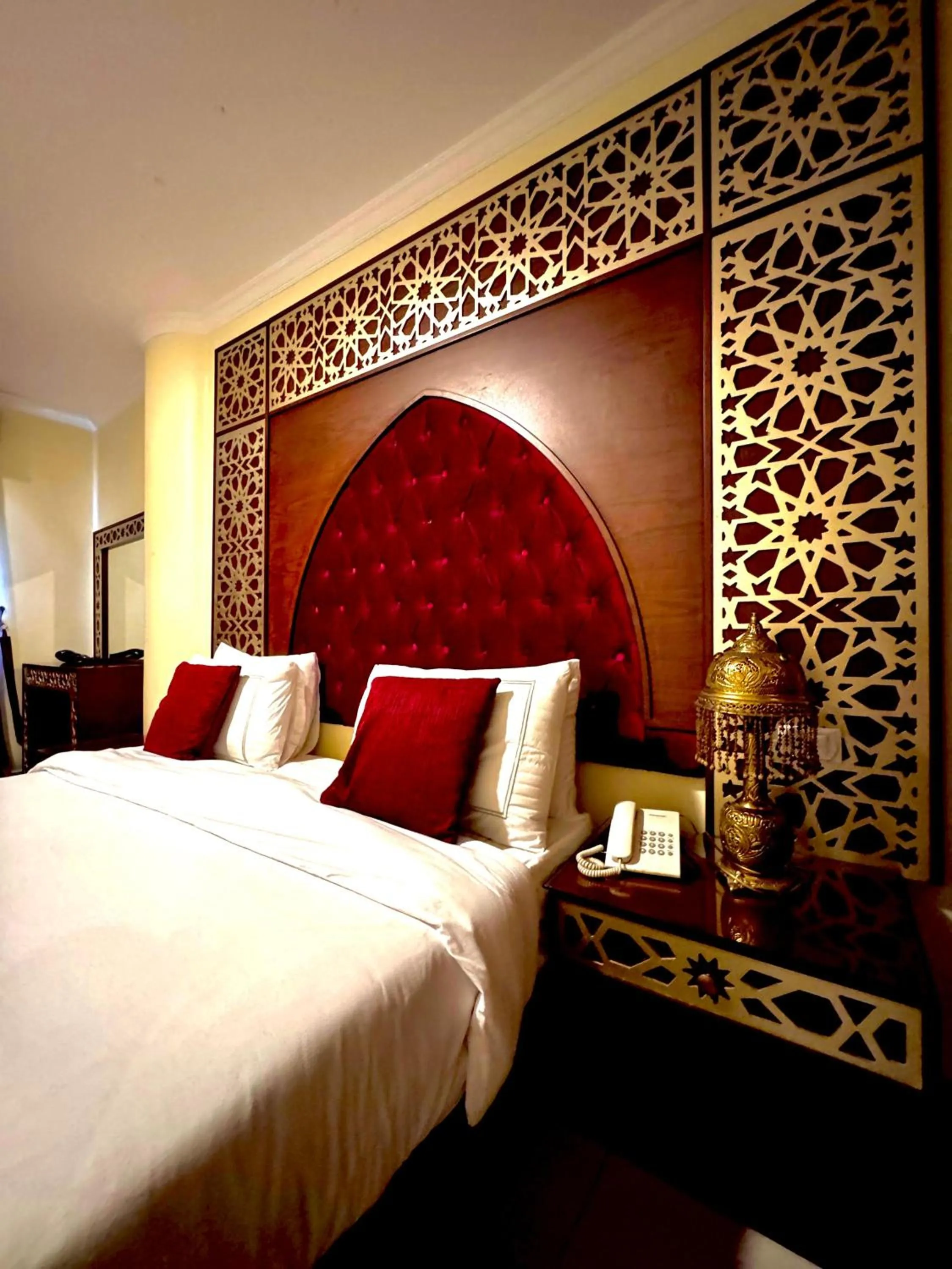 Bed in PYRAMIDS TOWER Inn