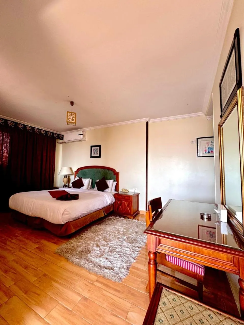 Bed in PYRAMIDS TOWER Inn