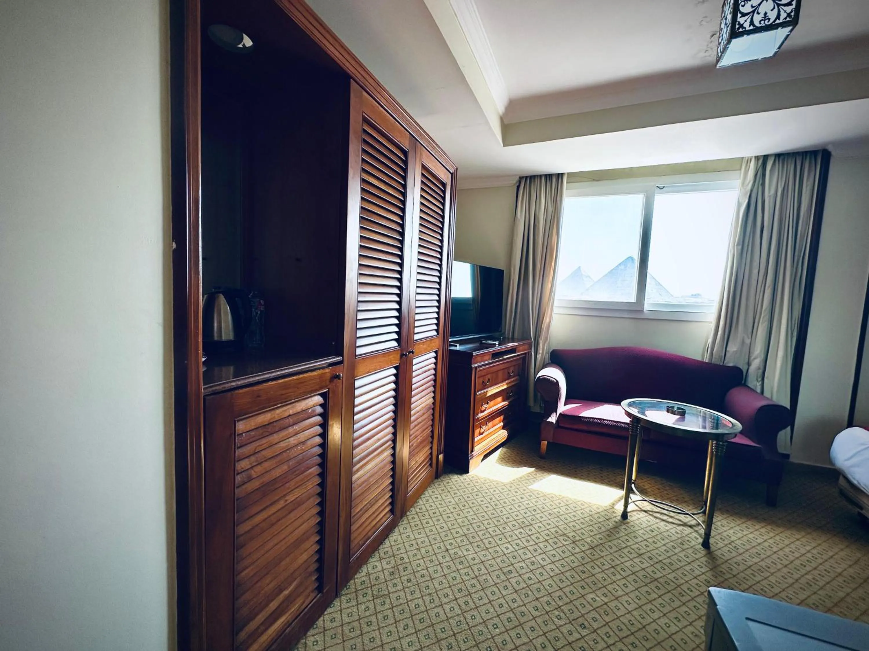 Bed in PYRAMIDS TOWER Inn