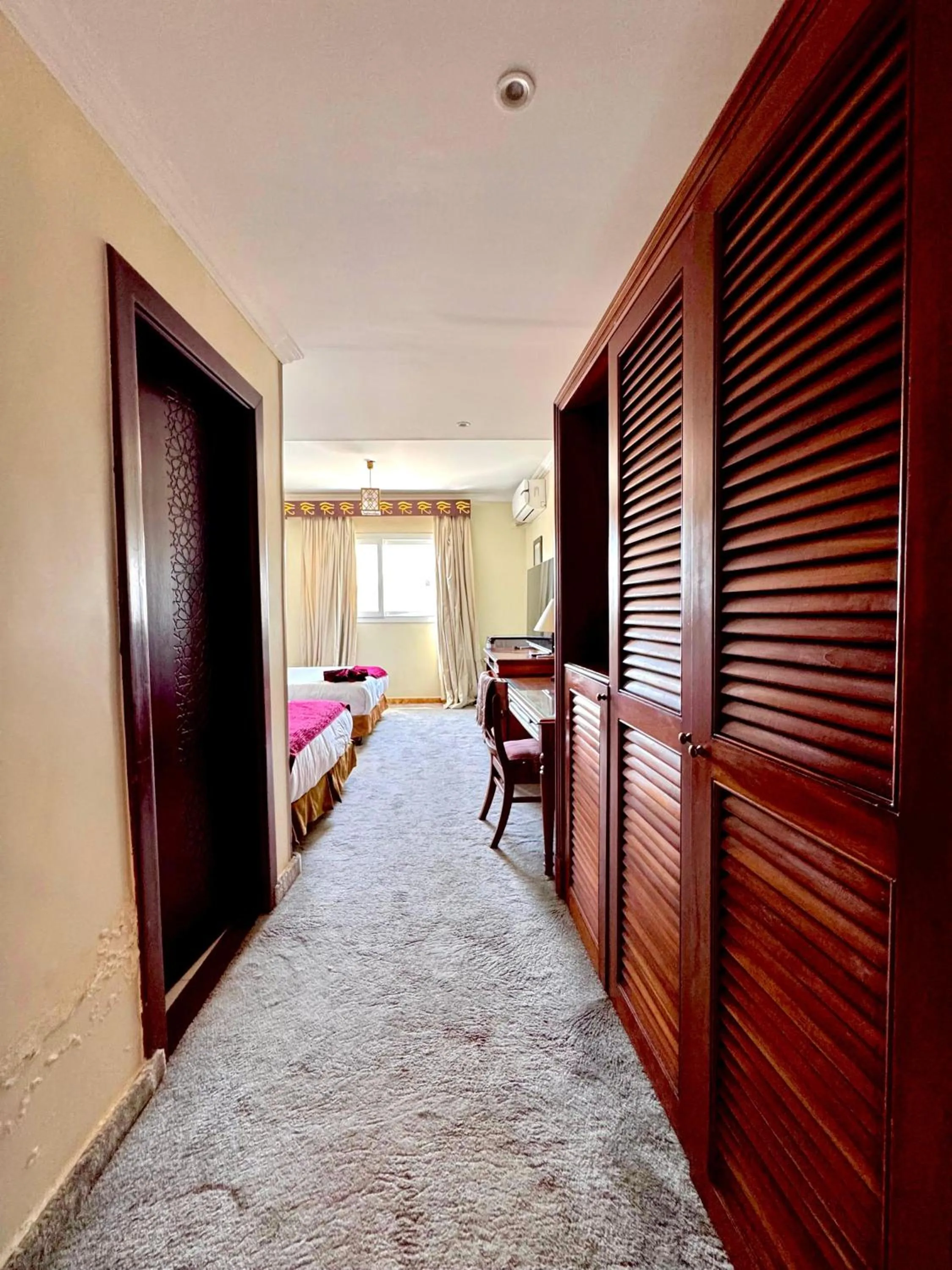 Bed in PYRAMIDS TOWER Inn