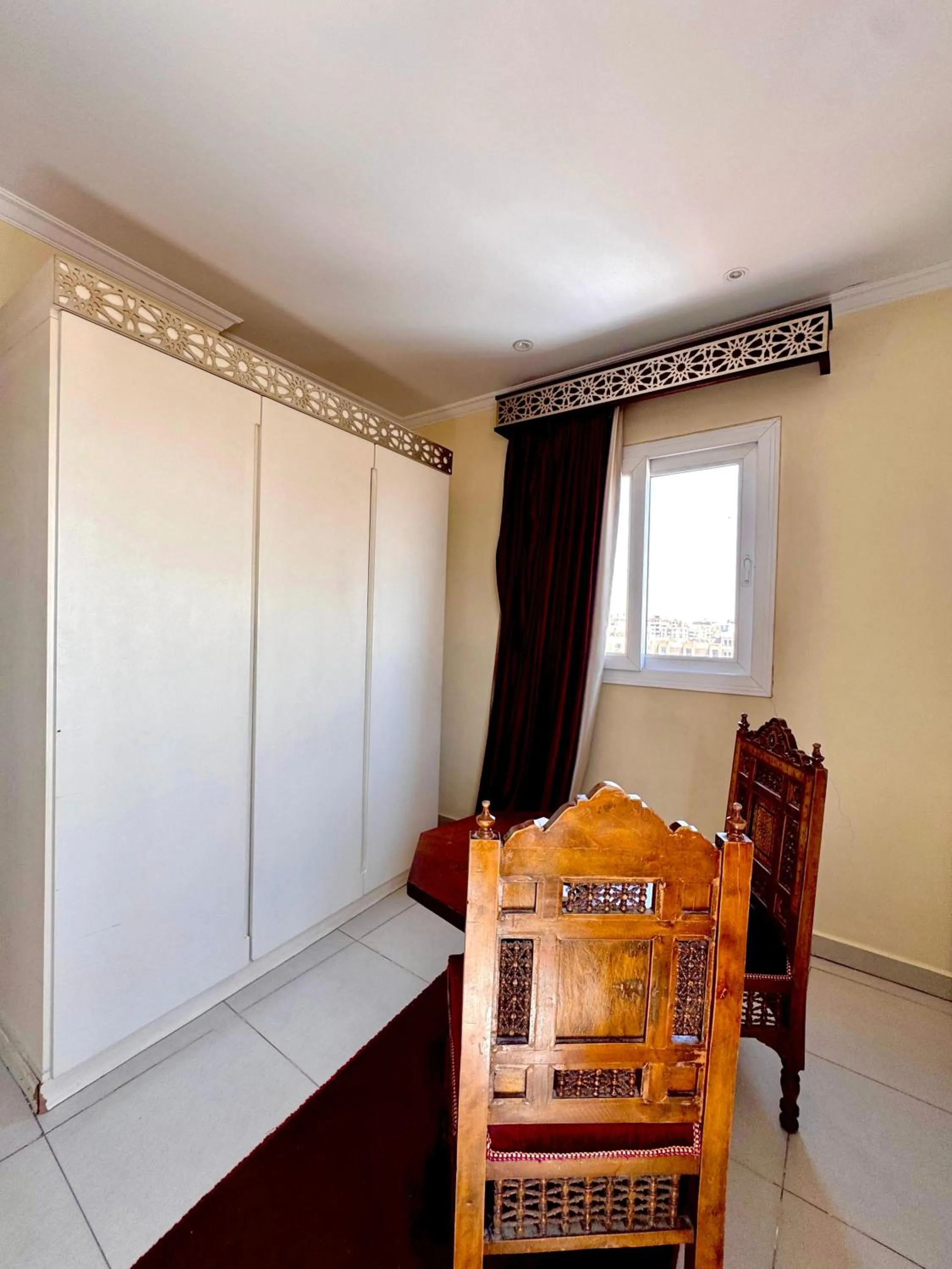 Photo of the whole room in PYRAMIDS TOWER Inn