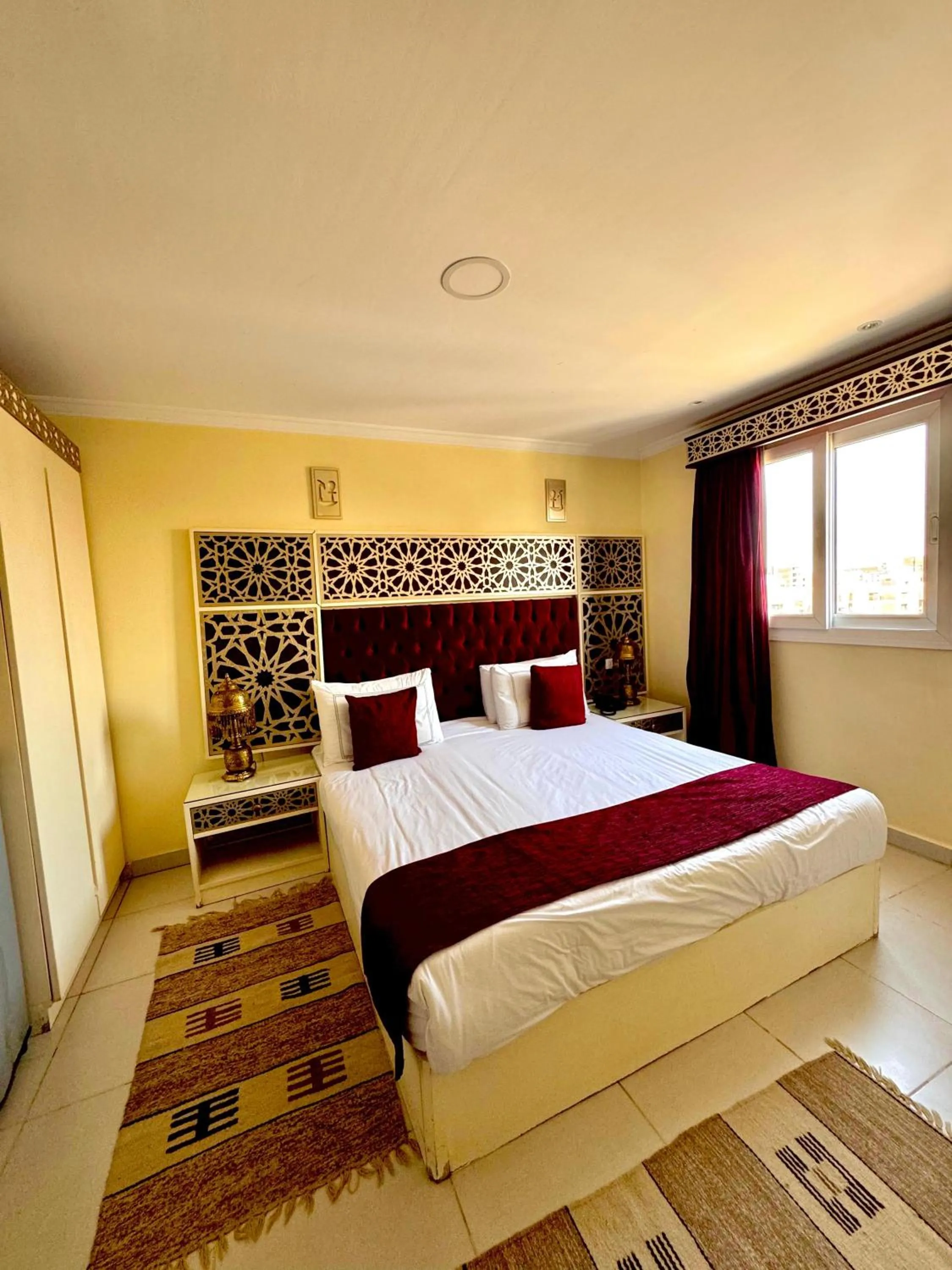 Bed in PYRAMIDS TOWER Inn