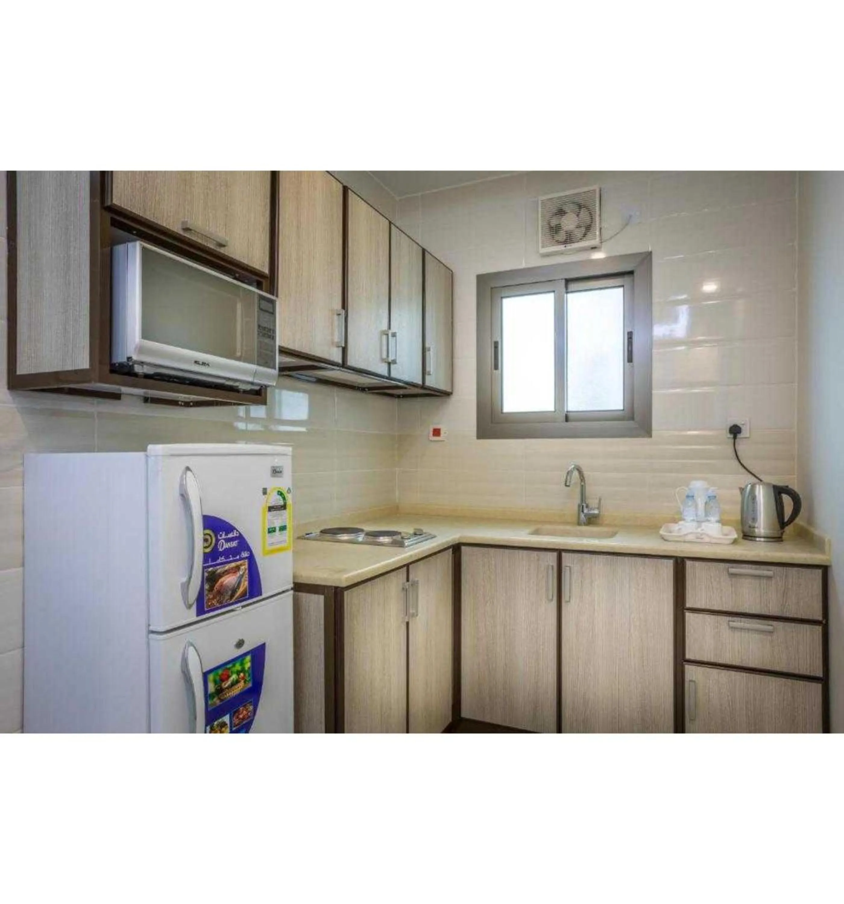 Kitchen or kitchenette in Palette Pearl Suites & Apartments