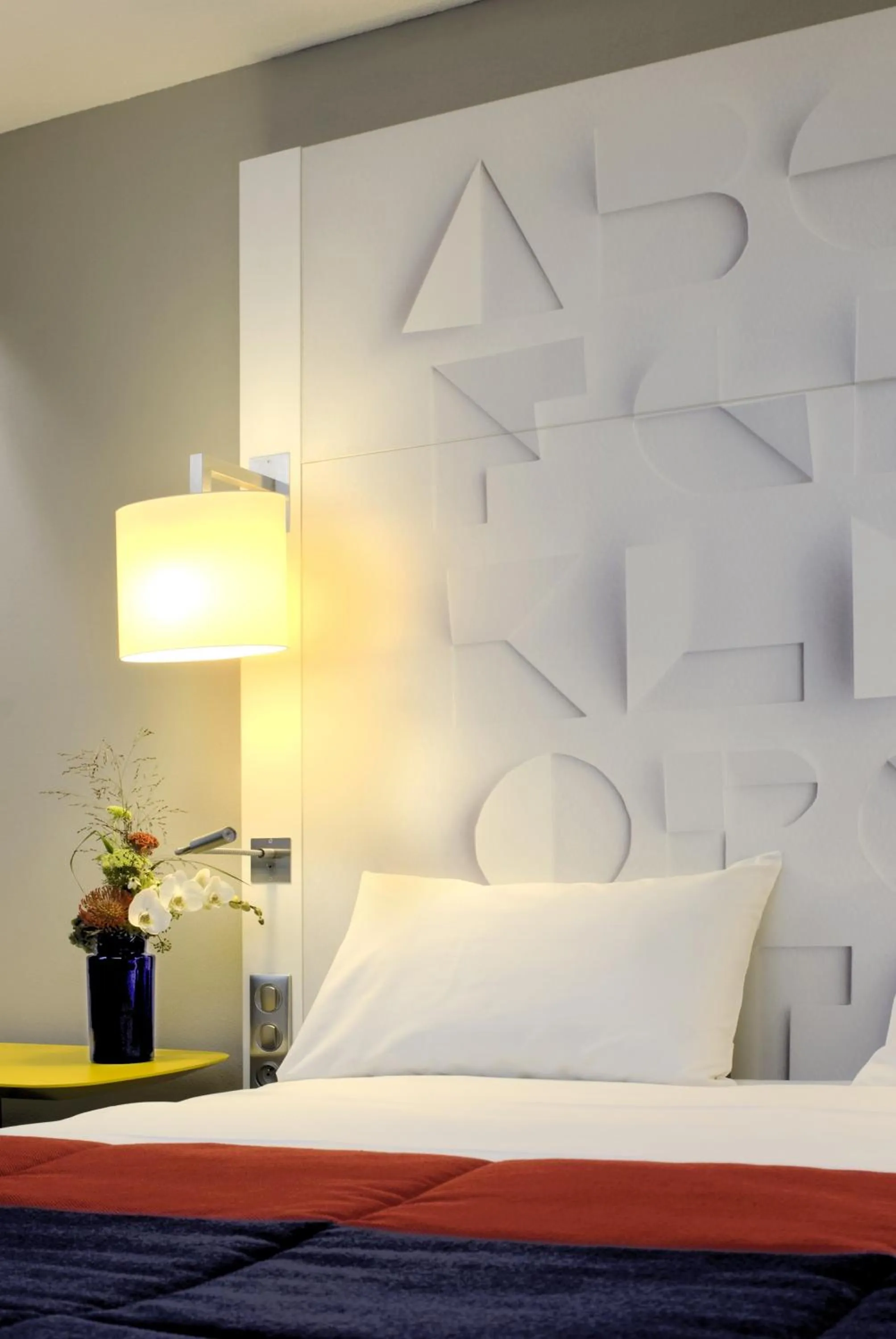 Decorative detail, Bed in Mercure Rennes Centre Parlement