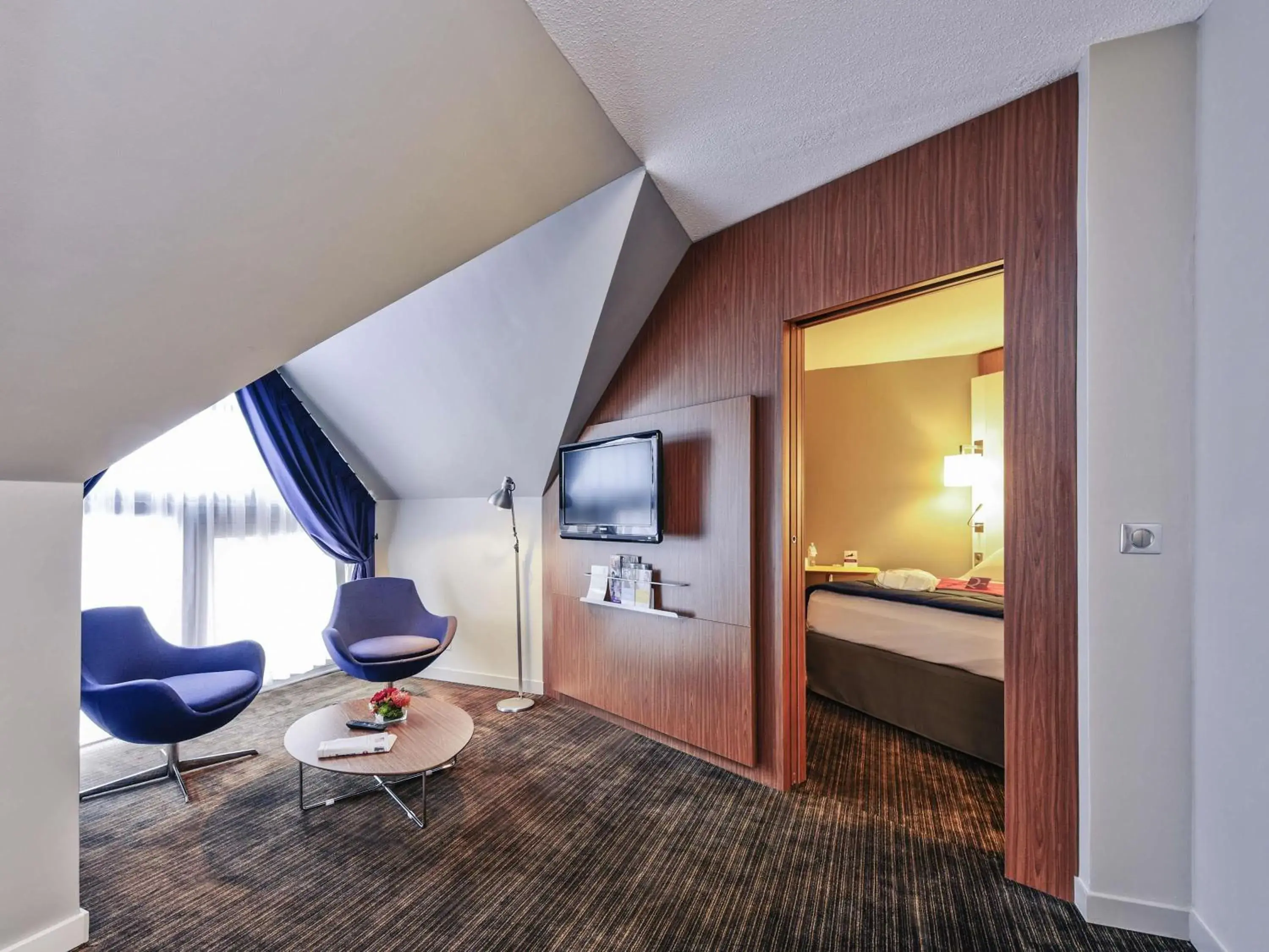 Superior Suite with One King Bed and convert ible Sofa in Mercure Rennes Centre Parlement Superior Suite with One King Bed and convert ible Sofa in Mercure Rennes Centre Parlement