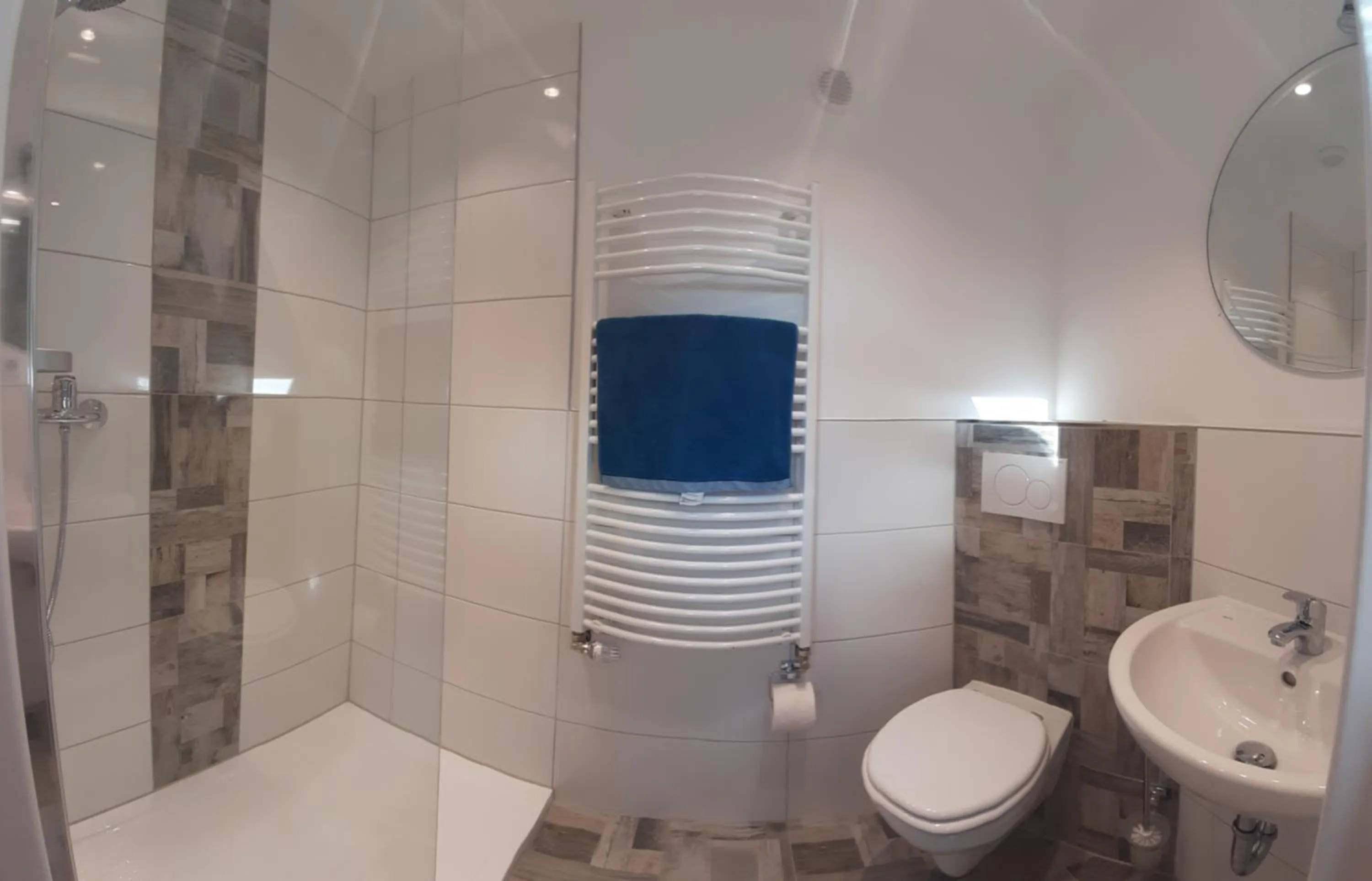 Shower in ApartmentHotel Vollumen