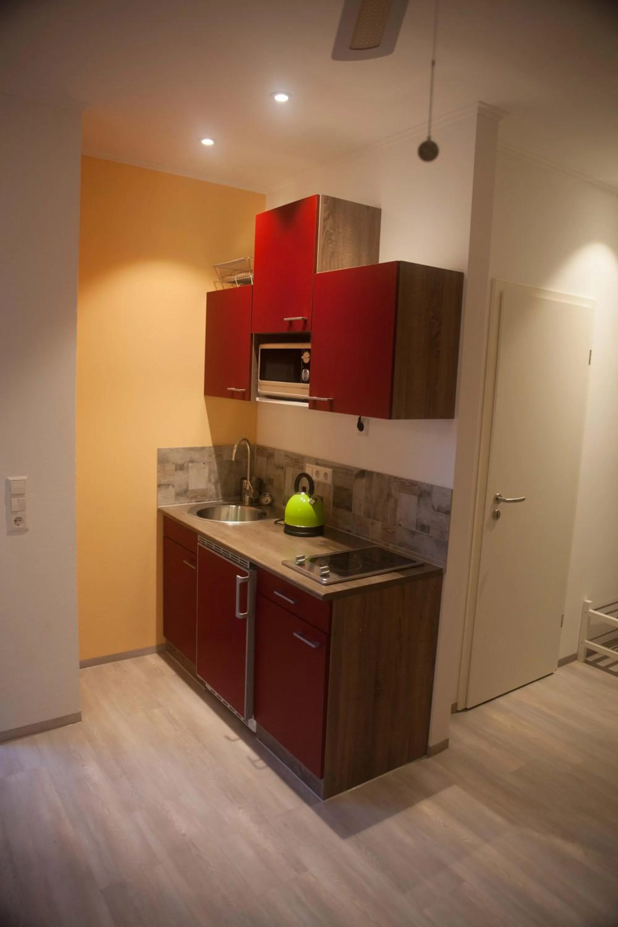 Kitchen or kitchenette in ApartmentHotel Vollumen