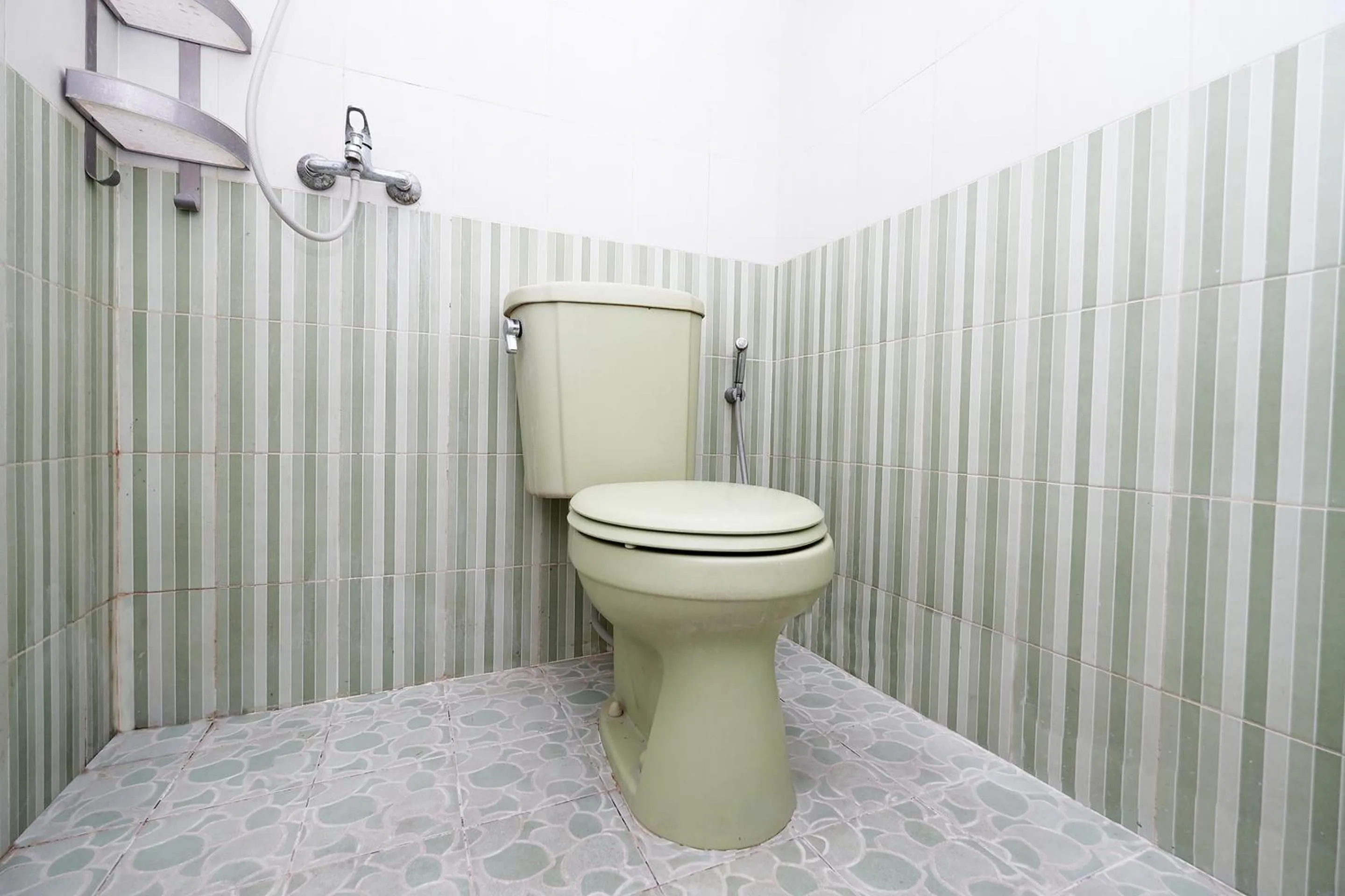 Bathroom in OYO 1815 Gatsu Residence