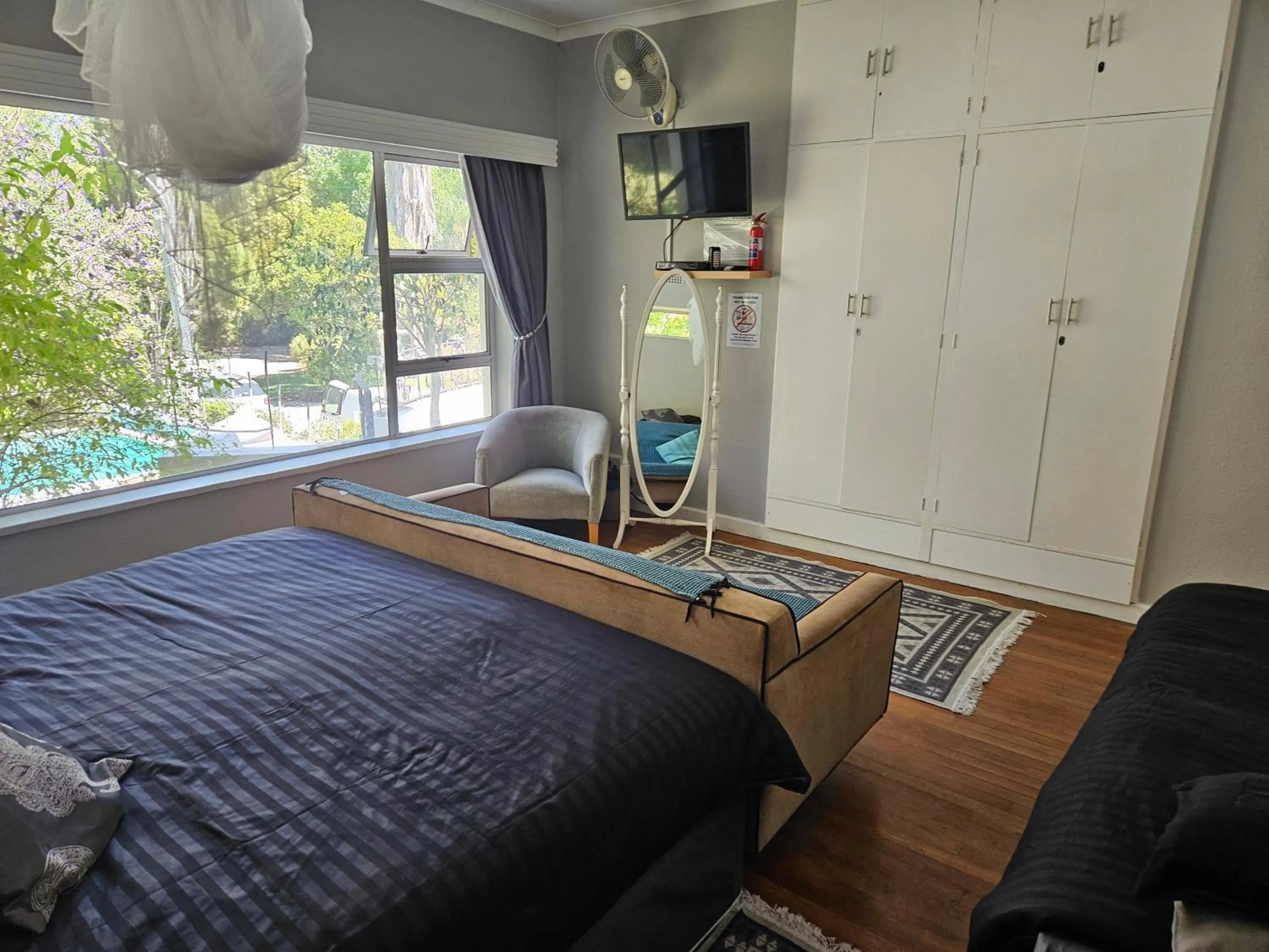 Bed in Bloom Guest House