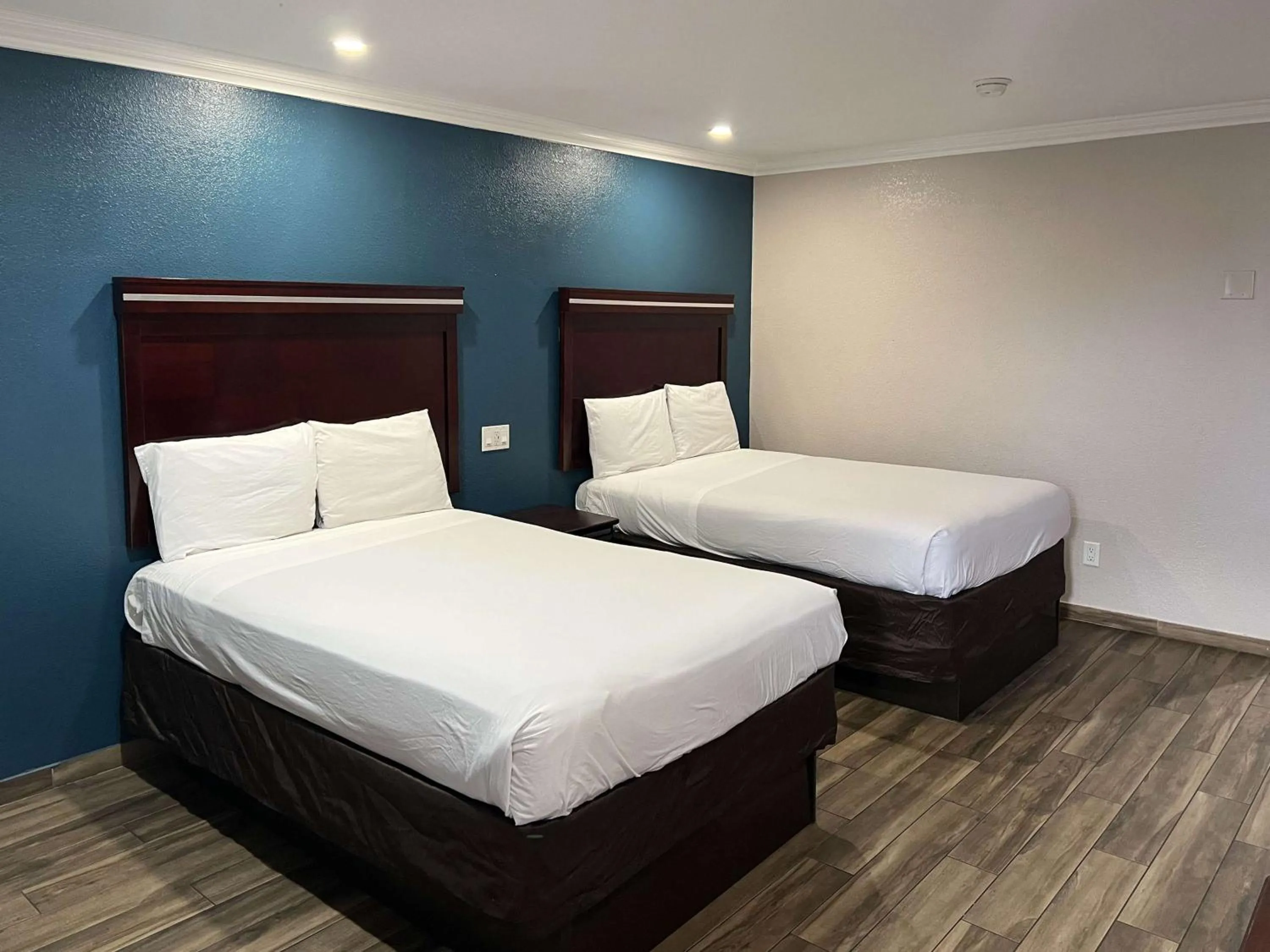 Photo of the whole room, Bed in Studio 6 Suites Mesa AZ Near Downtown & Sloan Park