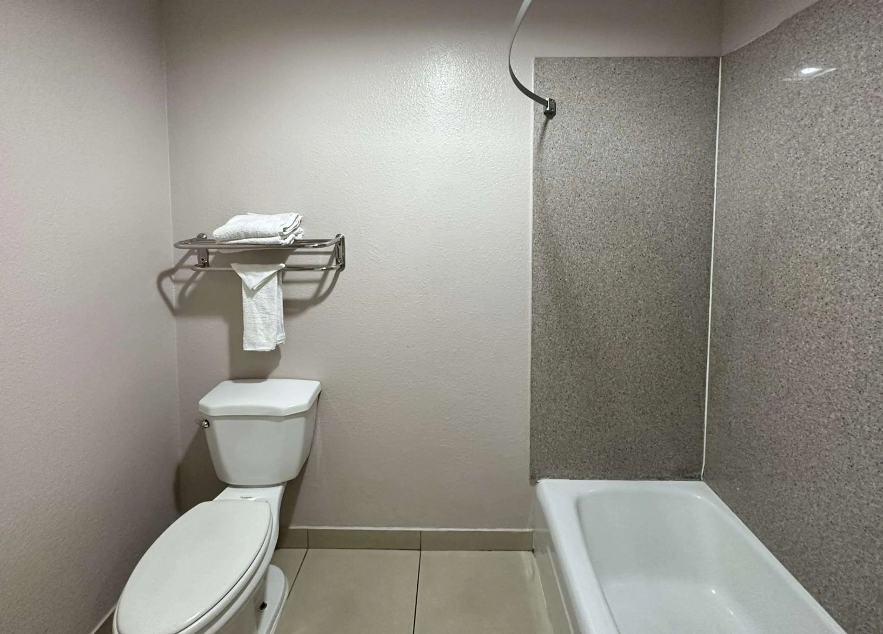 Bedroom in Studio 6 Suites Mesa AZ Near Downtown & Sloan Park