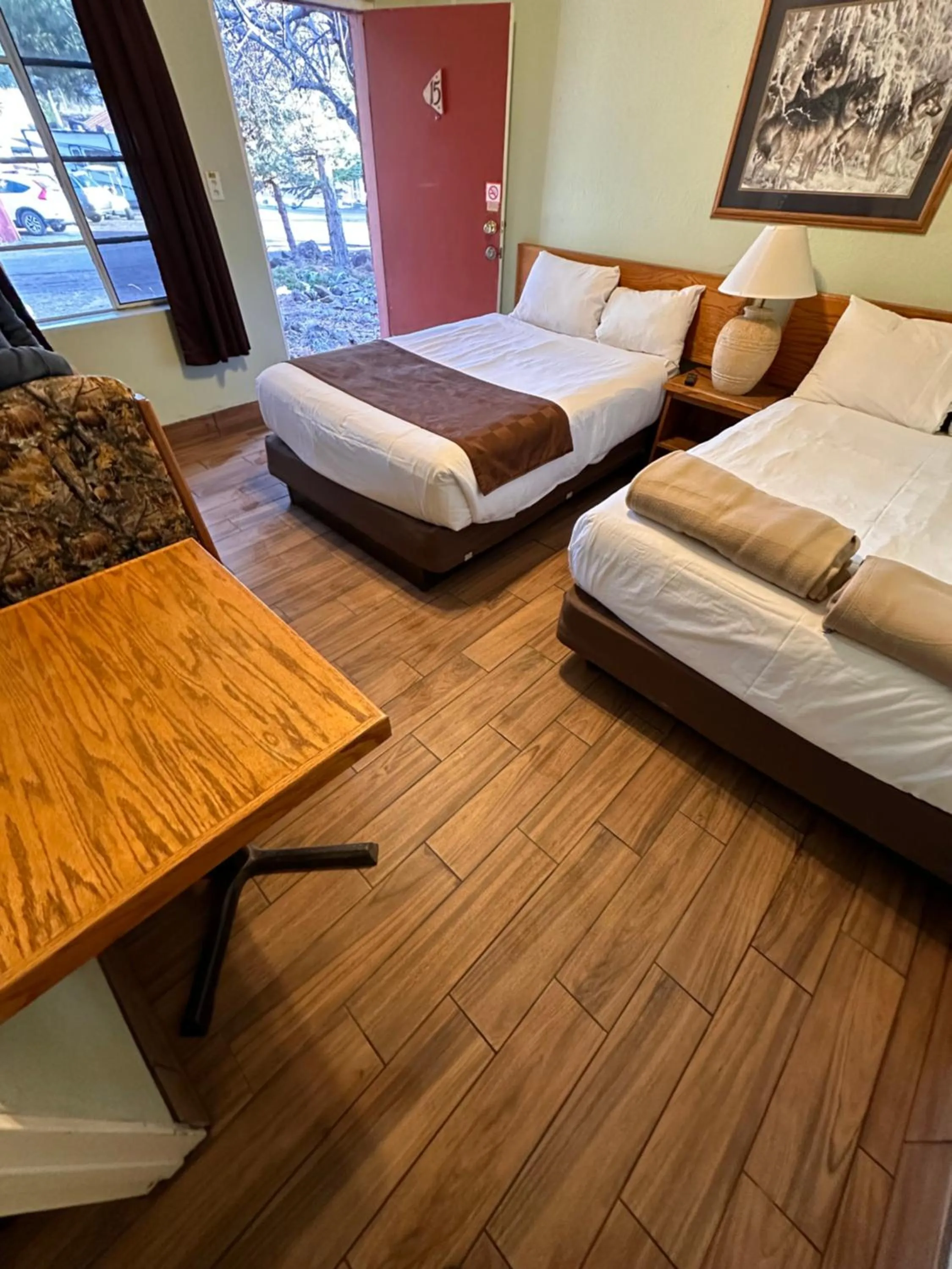 Bed in The Canyon Motel & RV Park