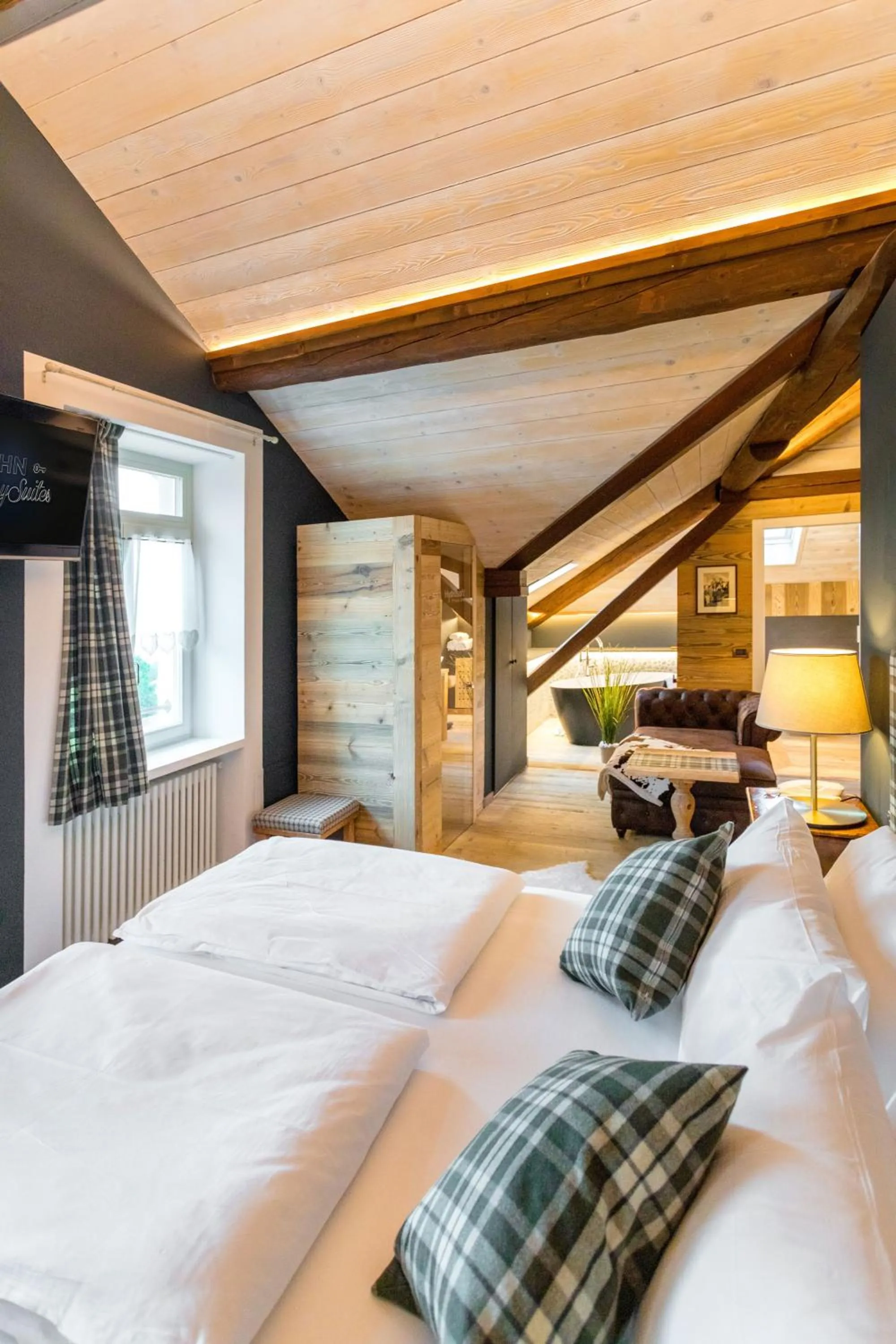 Bed in John Luxury Suites