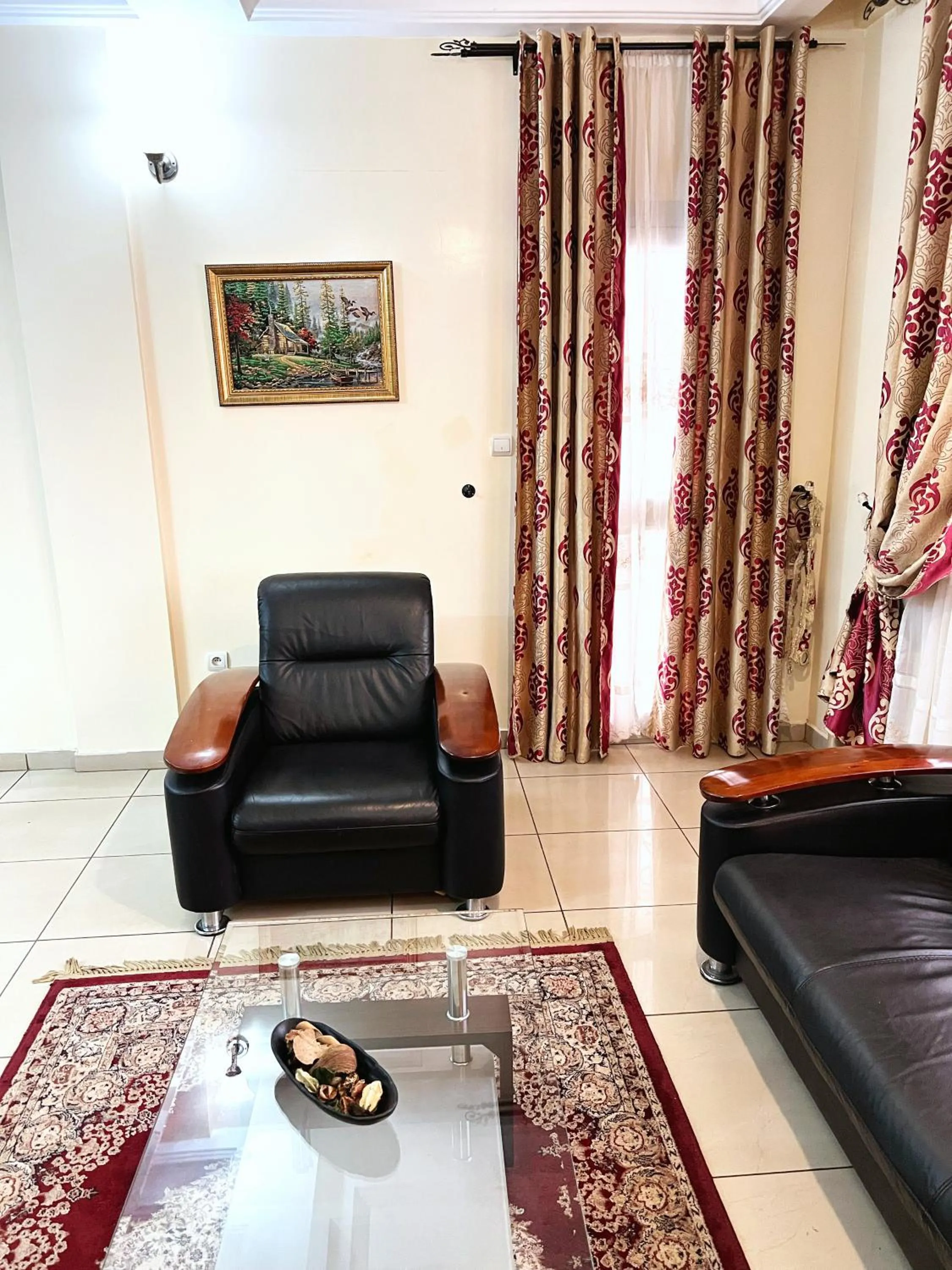 Living room in Résidences hôtelières Micheline et Emile BASTOS