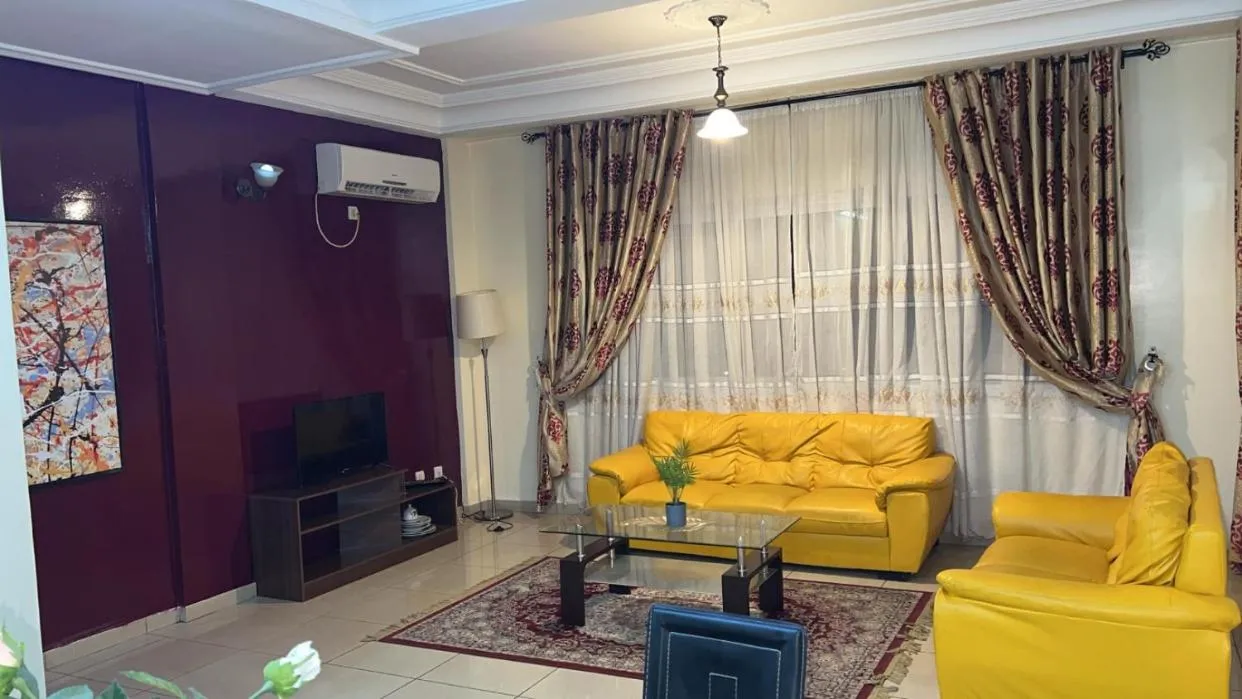 Living room in Résidences hôtelières Micheline et Emile BASTOS