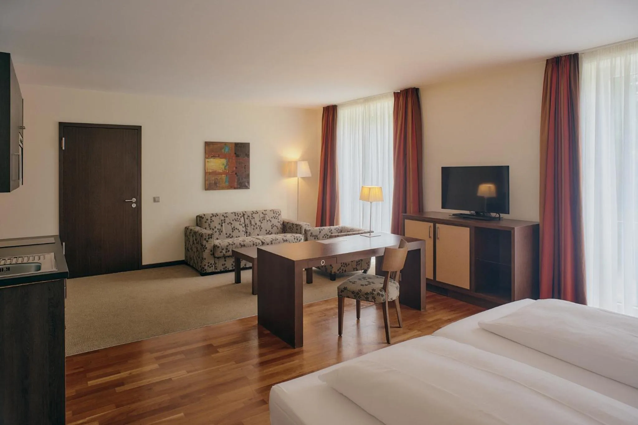 Living room, Bed in Aparthotel Treudelberg Hamburg