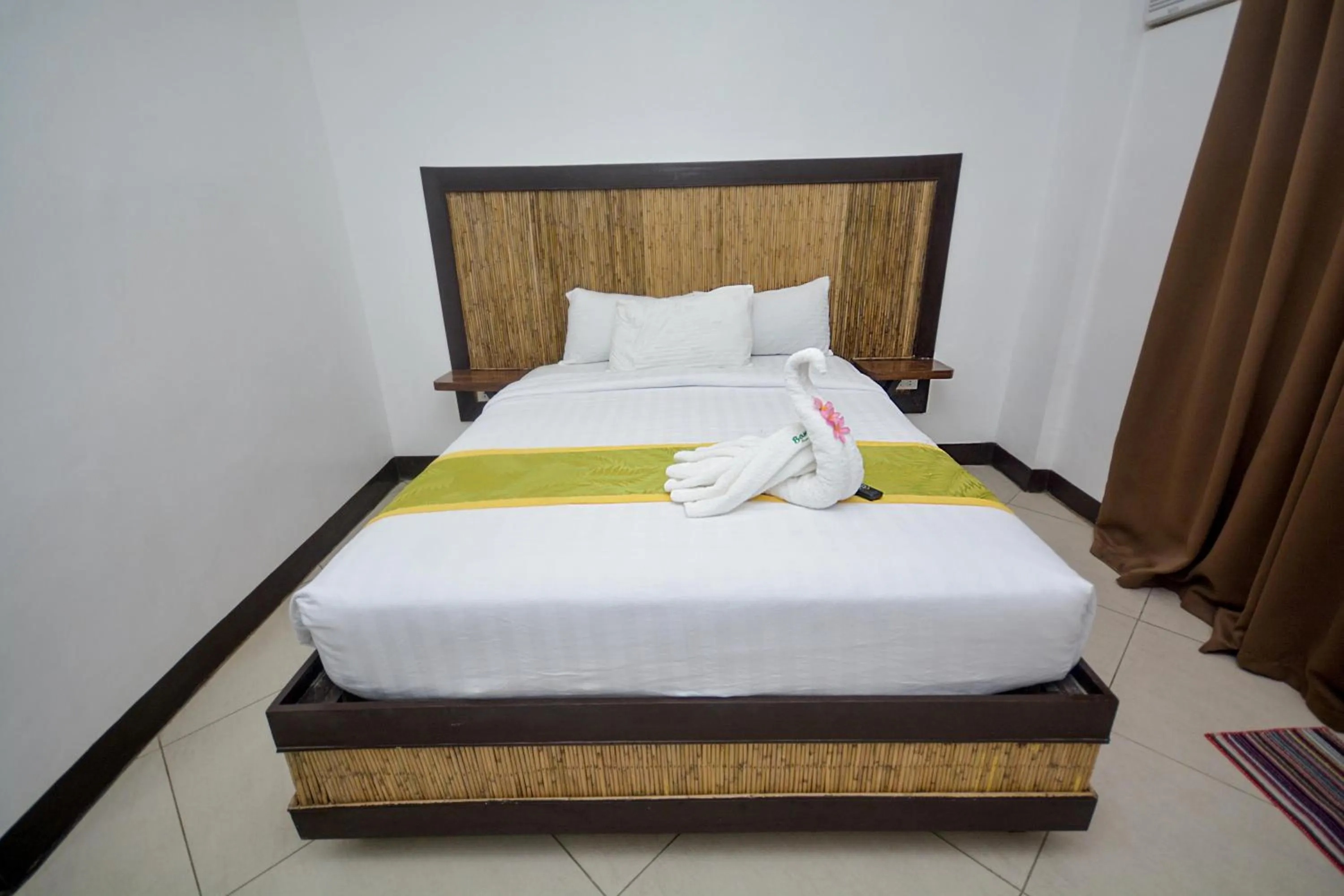 Bed in Bamboo Beach Resort & Restaurant