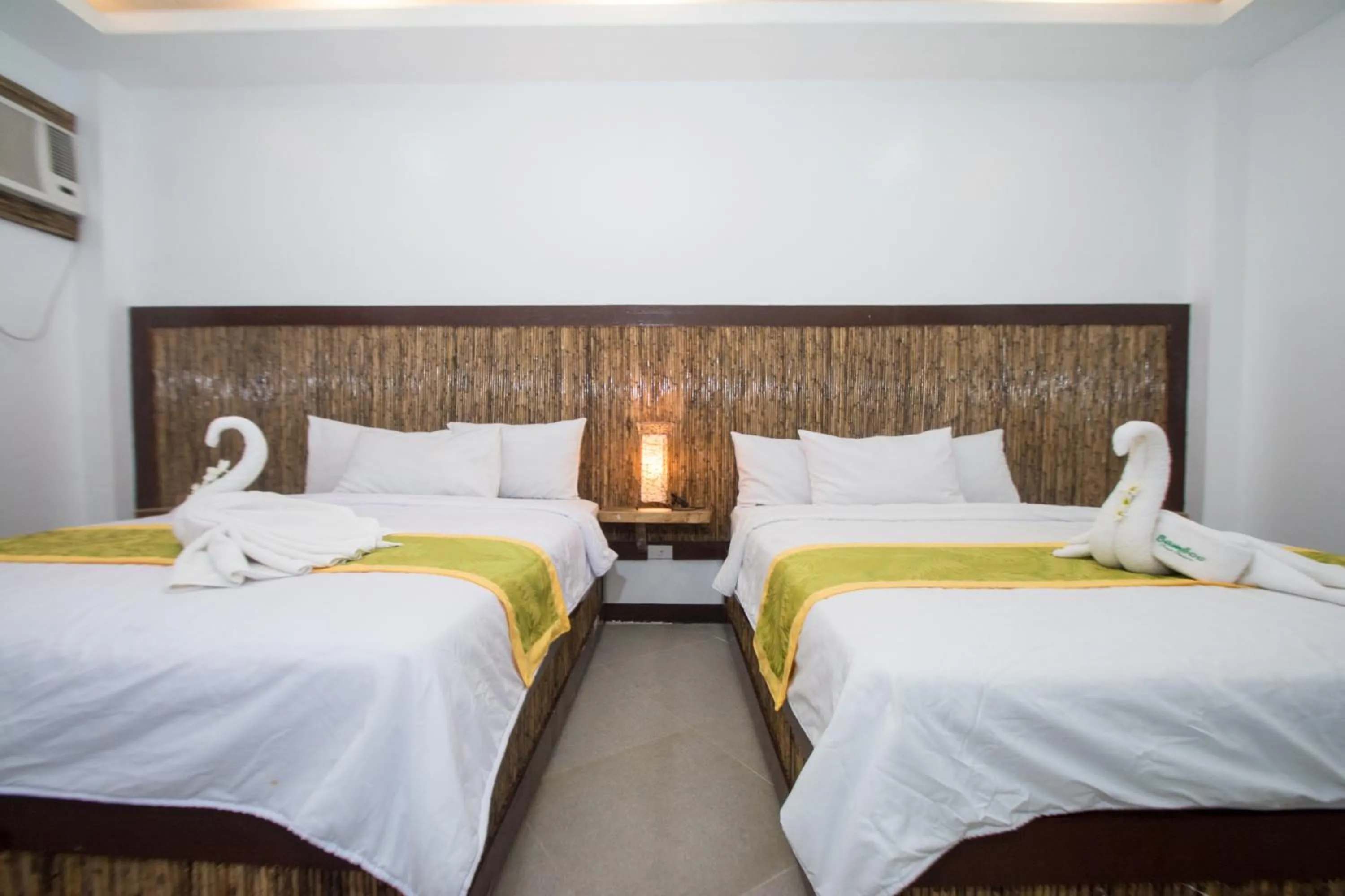 Bed in Bamboo Beach Resort & Restaurant