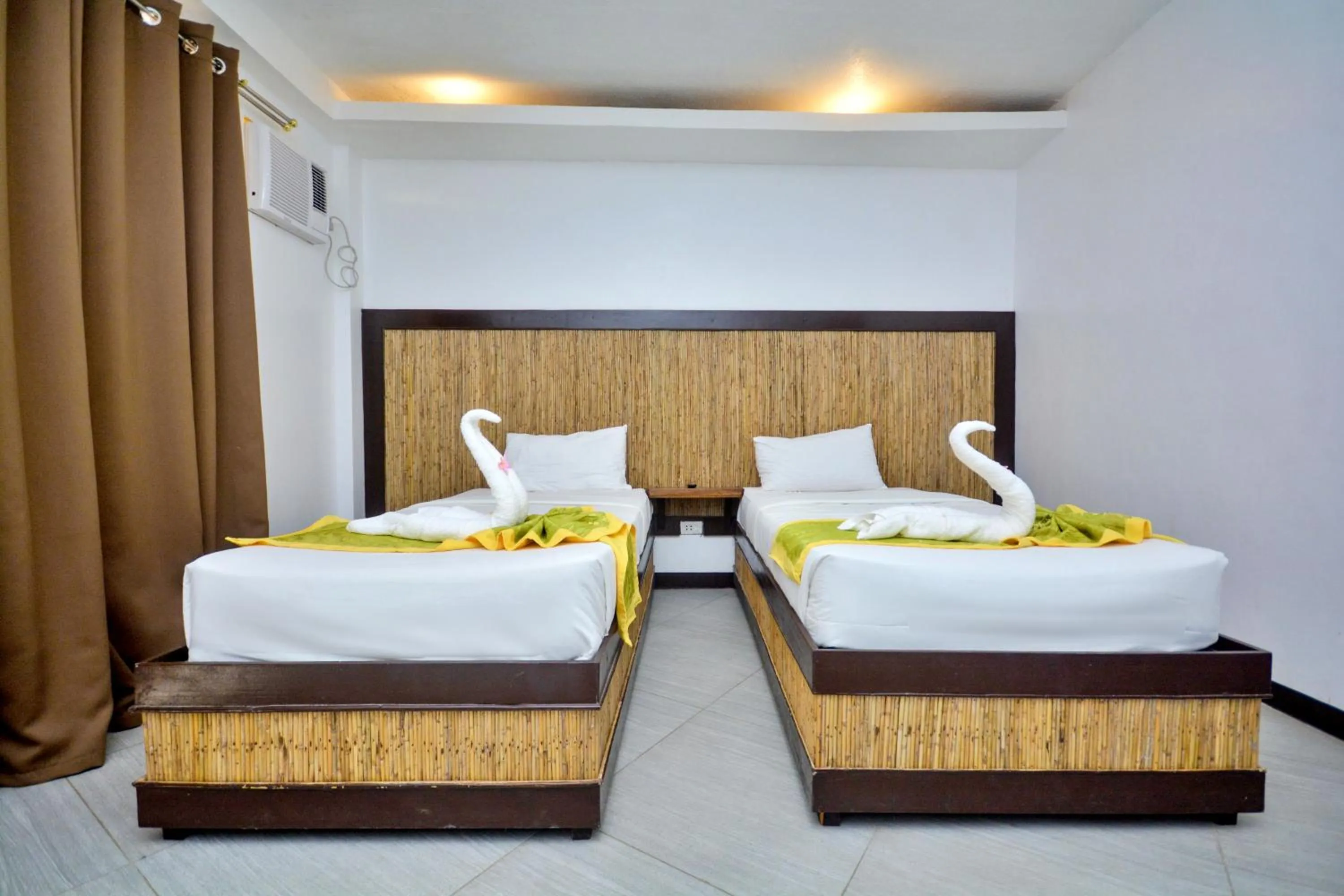 Bed in Bamboo Beach Resort & Restaurant