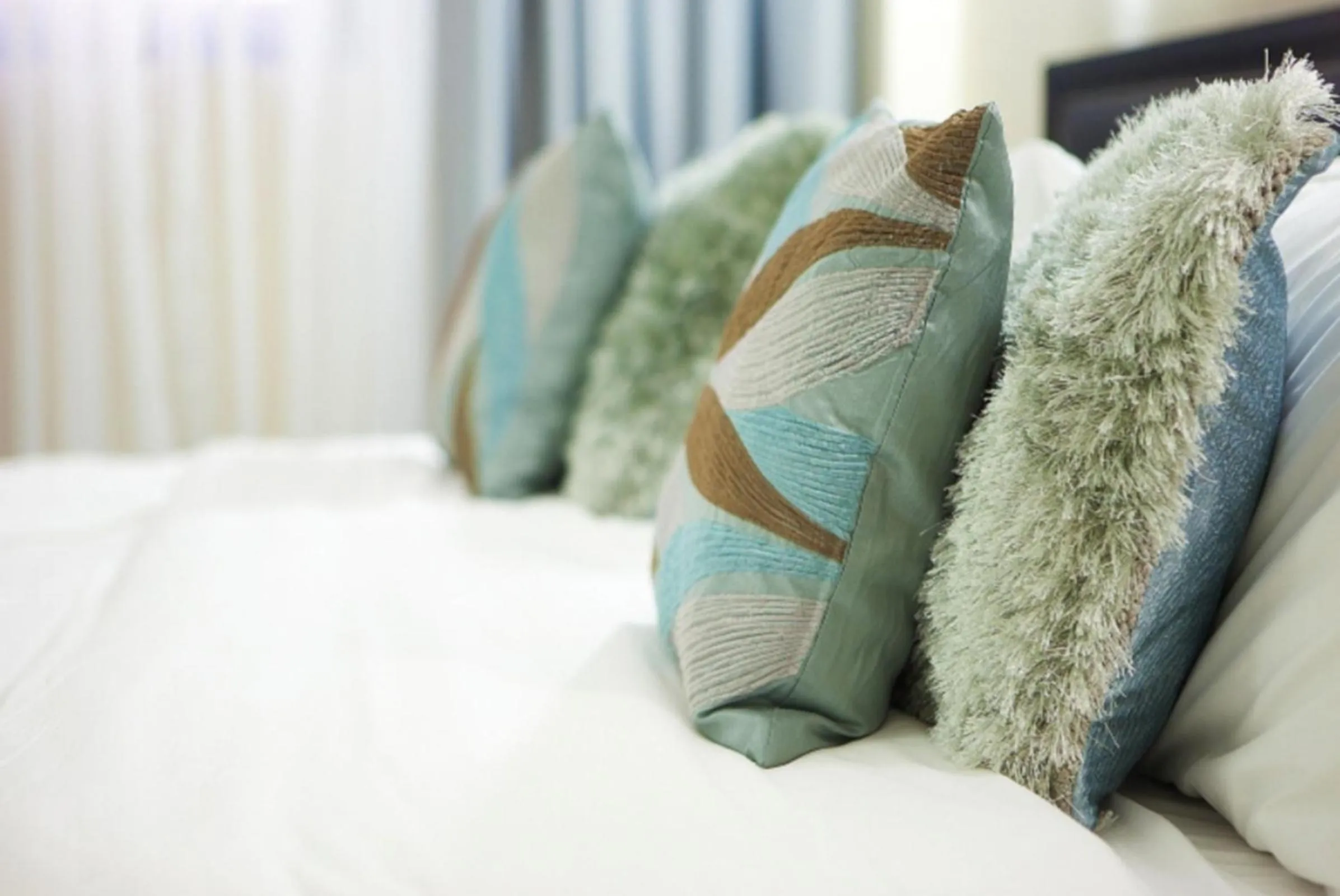 Bed in Oak Plaza Hotels East Airport