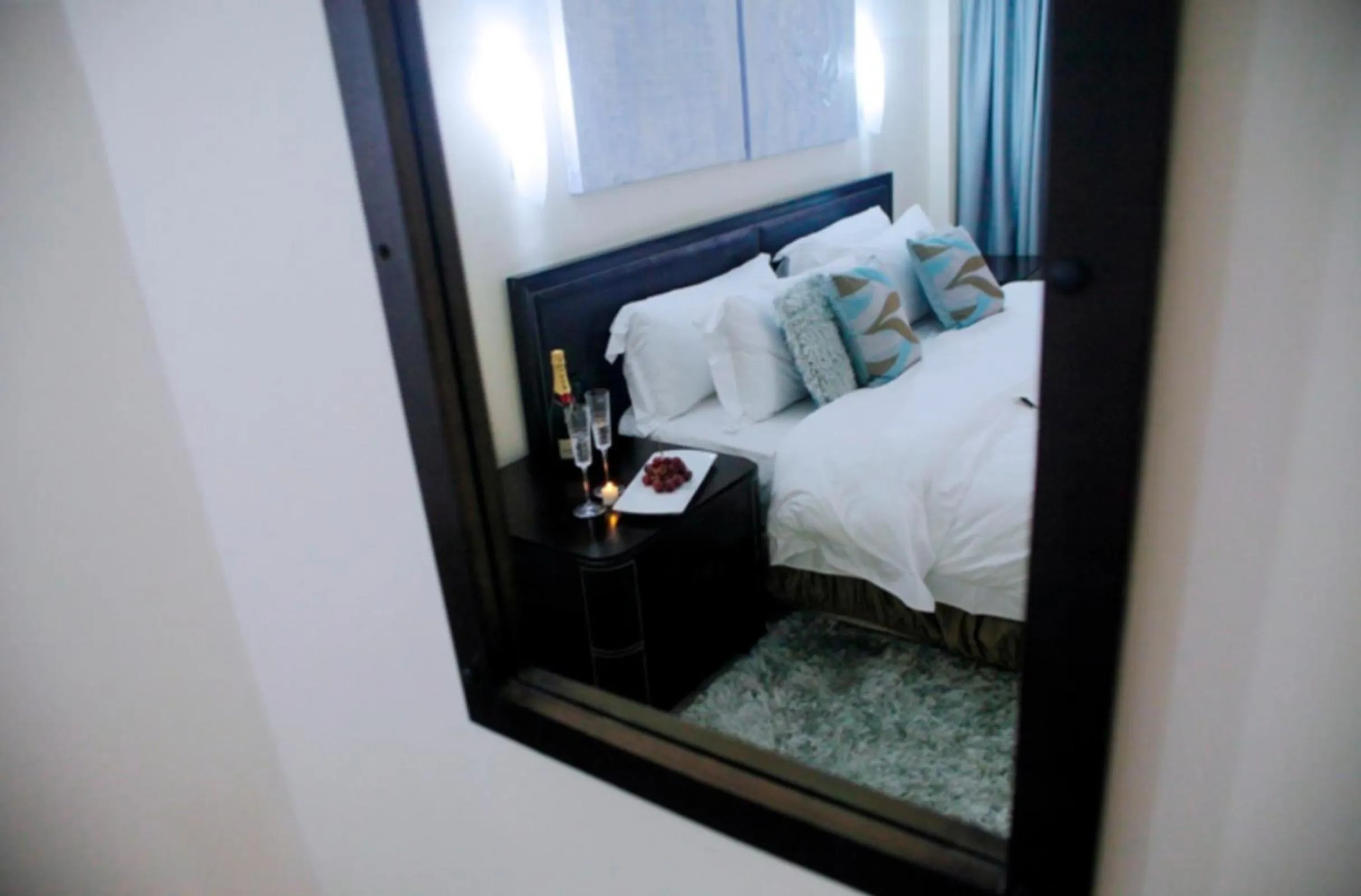 Bed in Oak Plaza Hotels East Airport