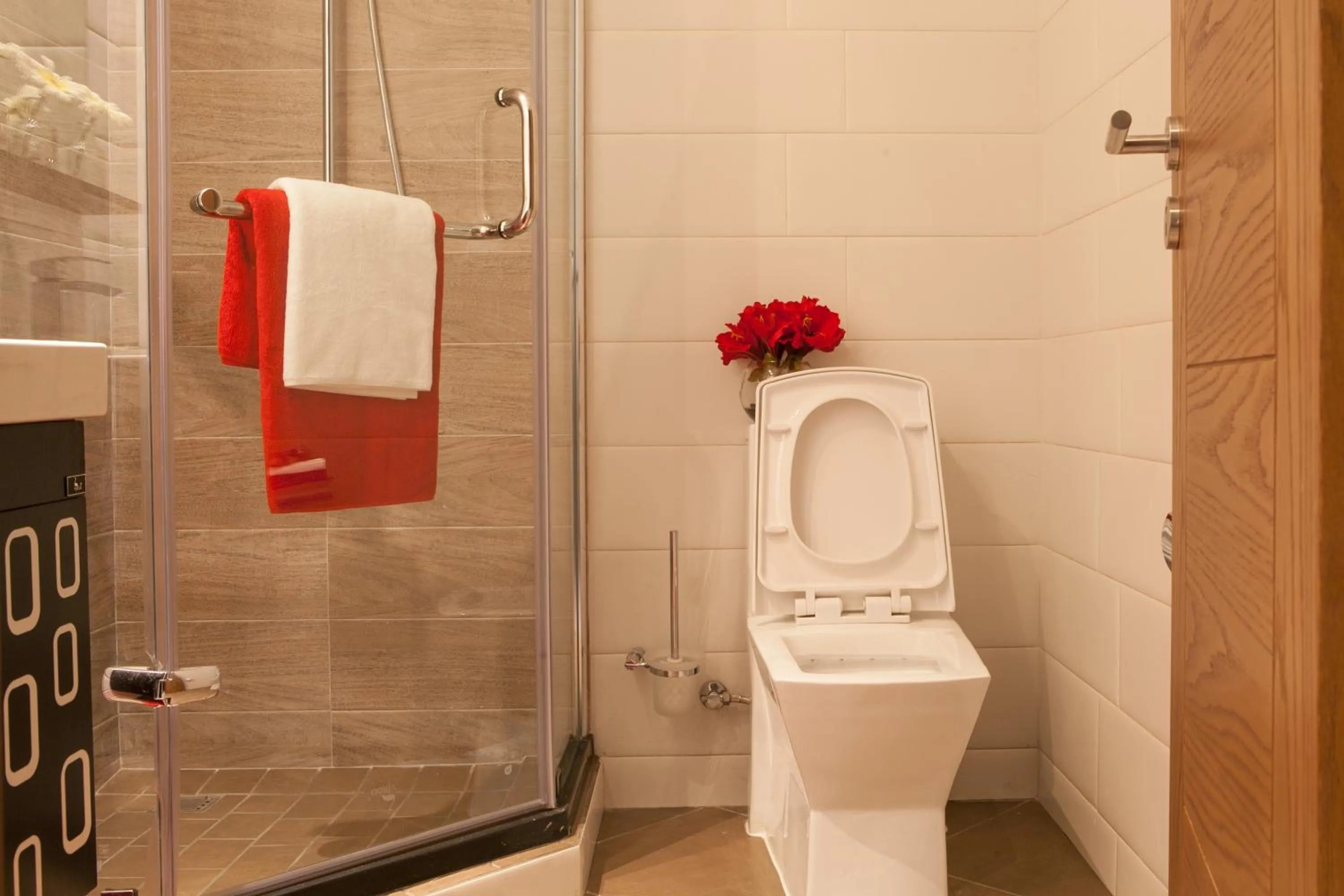 Toilet in Oak Plaza Hotels East Airport