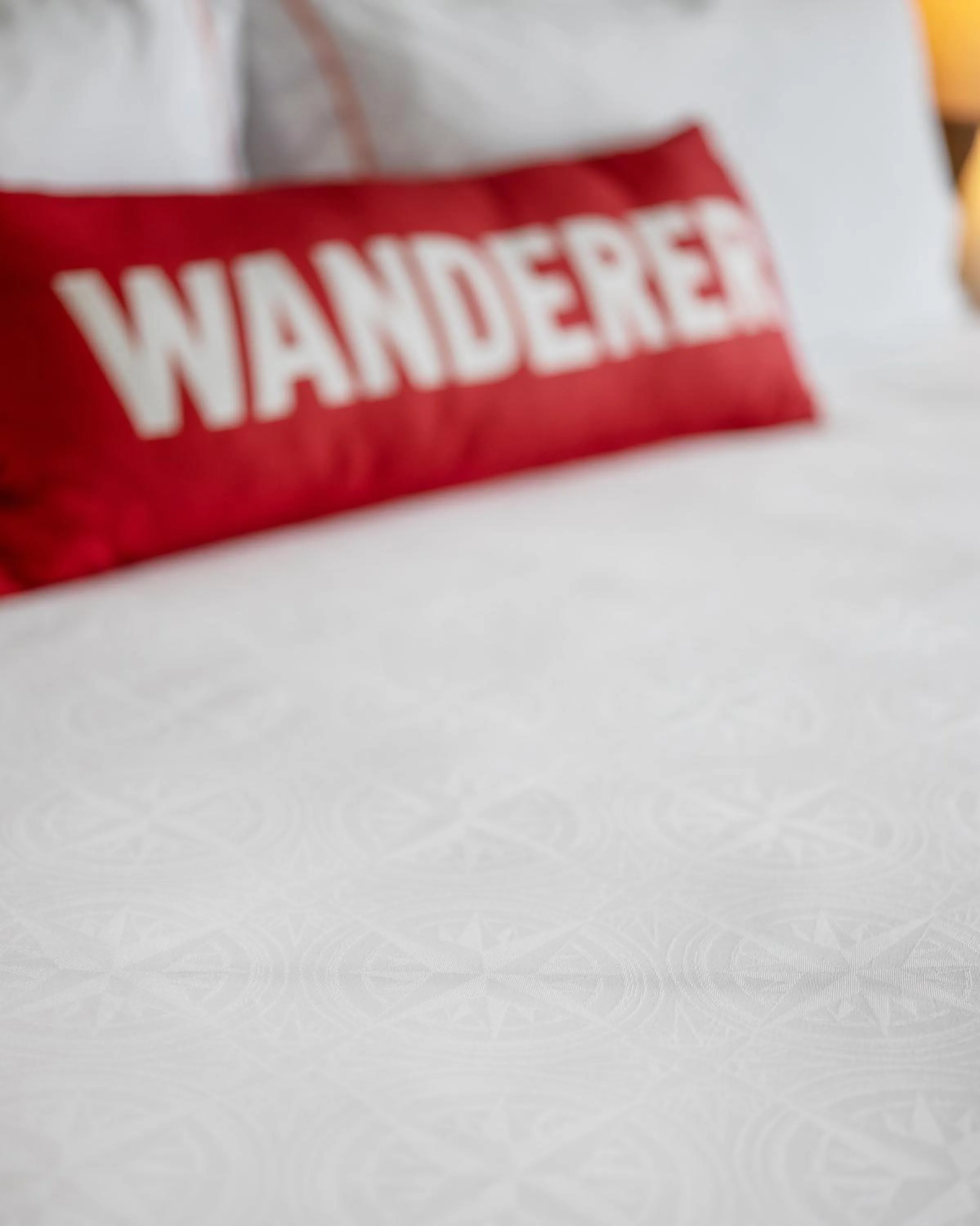 Bed in Compass Hotel by Margaritaville Anna Maria Sound