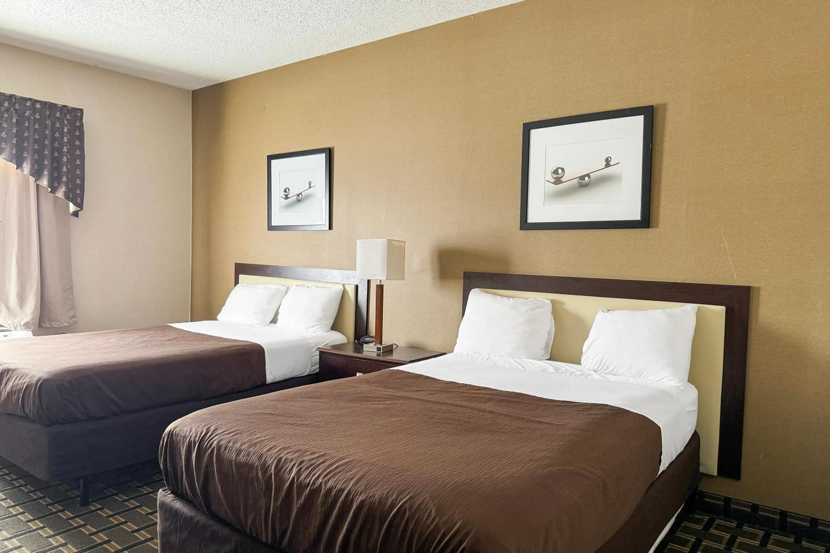 Bedroom, Bed in FairBridge Inn & Suites Batavia-Darien Amusement Park