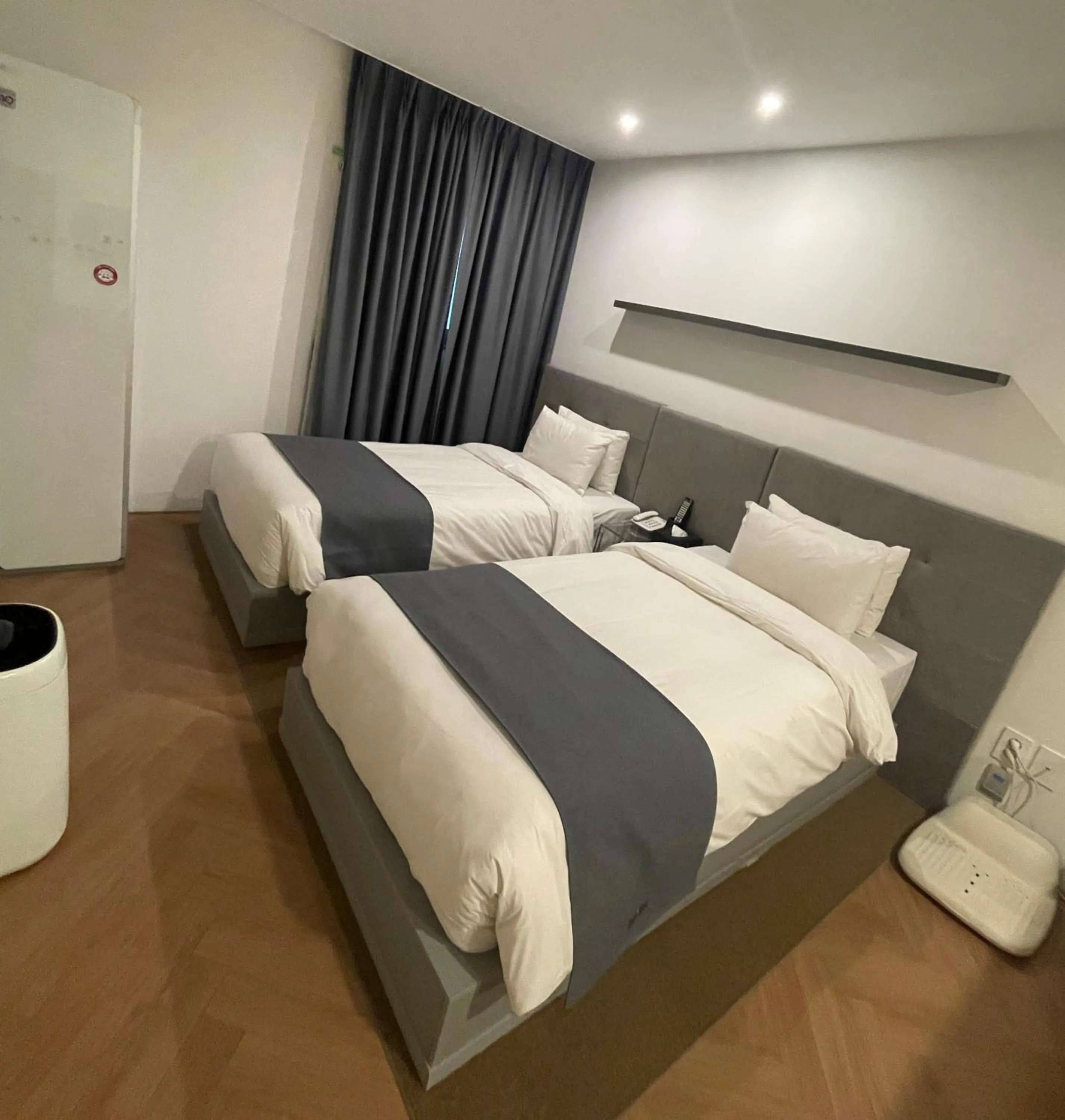 Bed in Hotel Noblestay