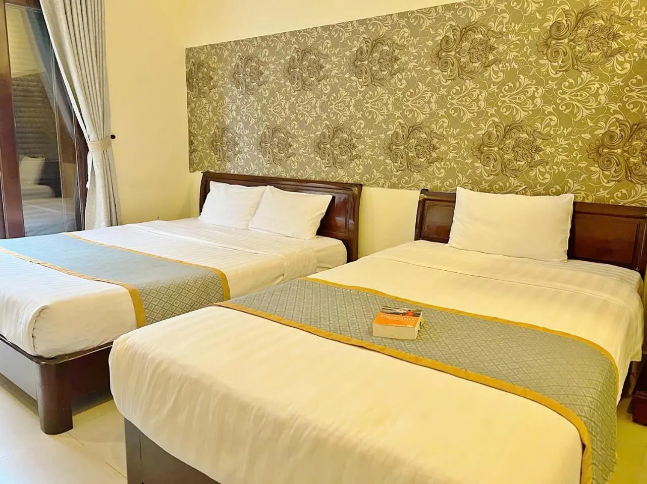 Bed in Golden River Hotel