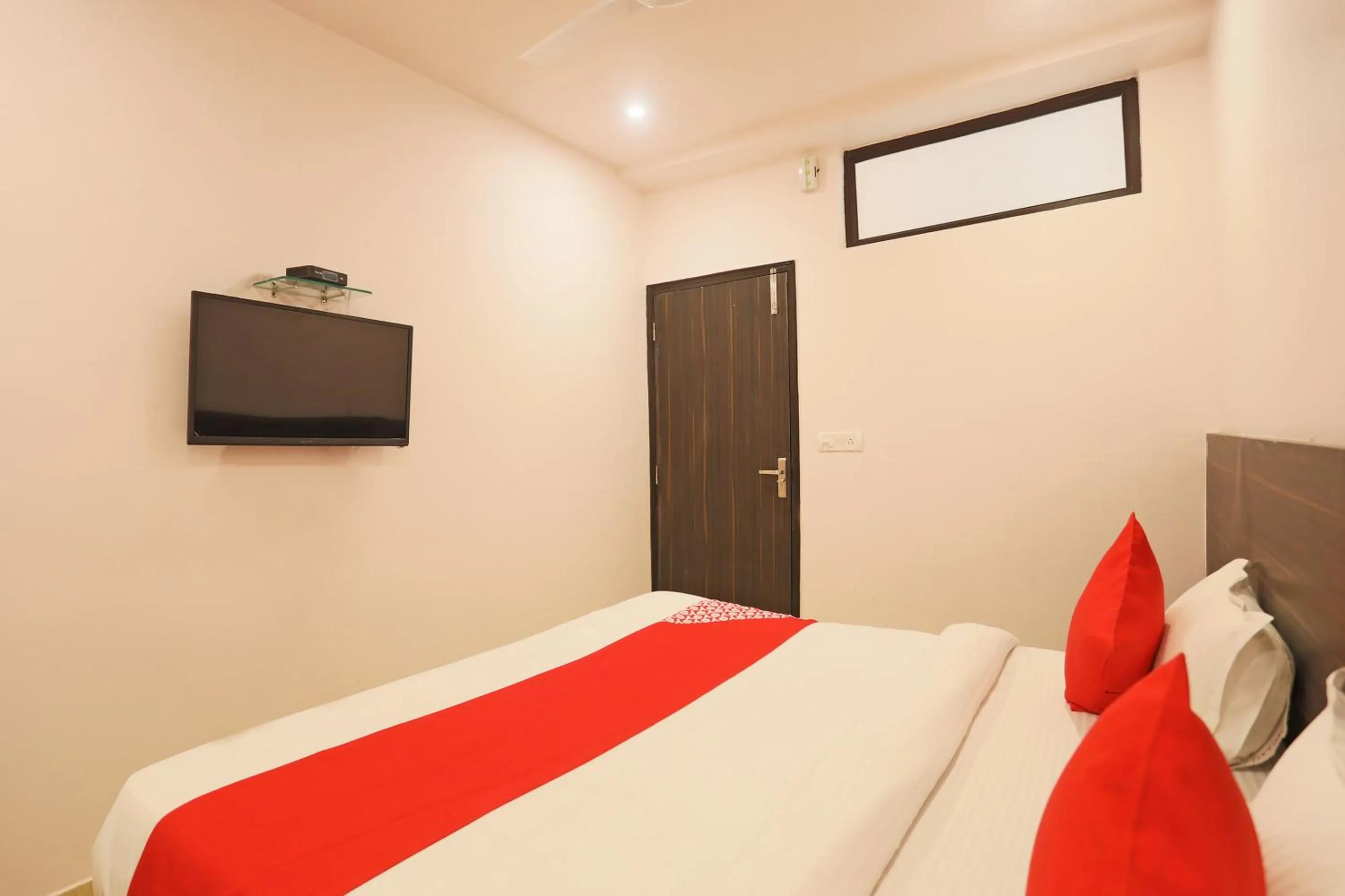 Bedroom in Hotel O DSG Residency