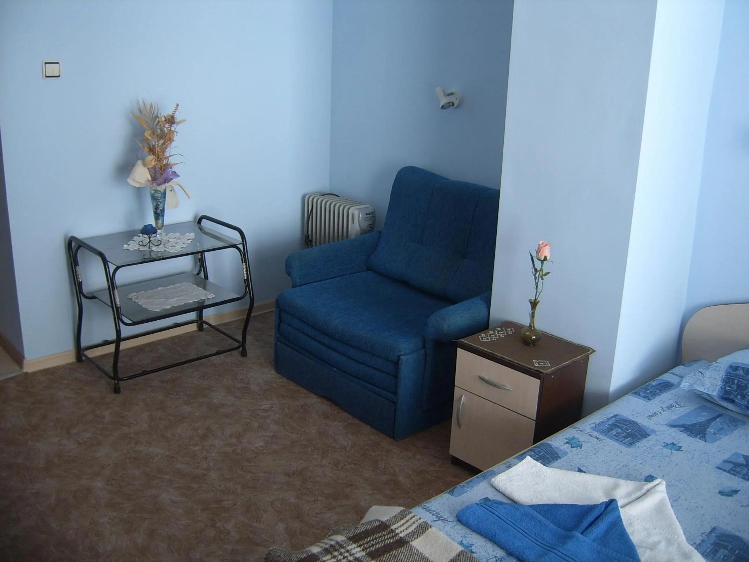 Seating area, Bed in Andi Hotel