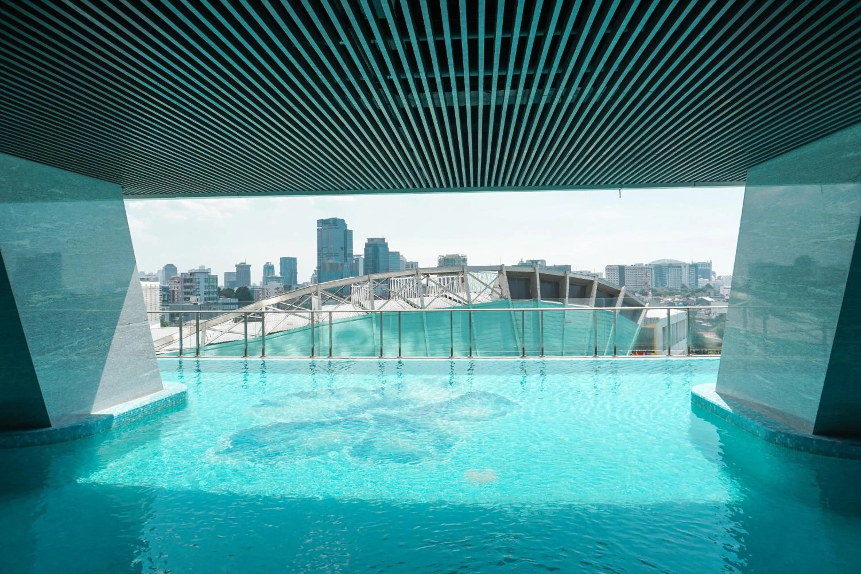 Swimming pool in Tranquil Studio Apartment at Menteng Park By Travelio