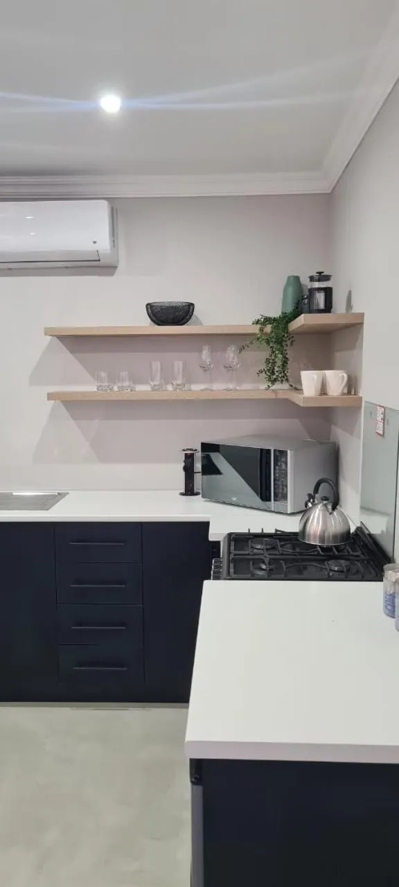 Kitchen or kitchenette in Uitsig Boutique Hotel