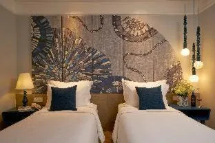 Bedroom, Bed in Sofiana My Khe Hotel & Spa - Rooftop Pool Bar - Free Craft Beer and 20 minute Spa per Room