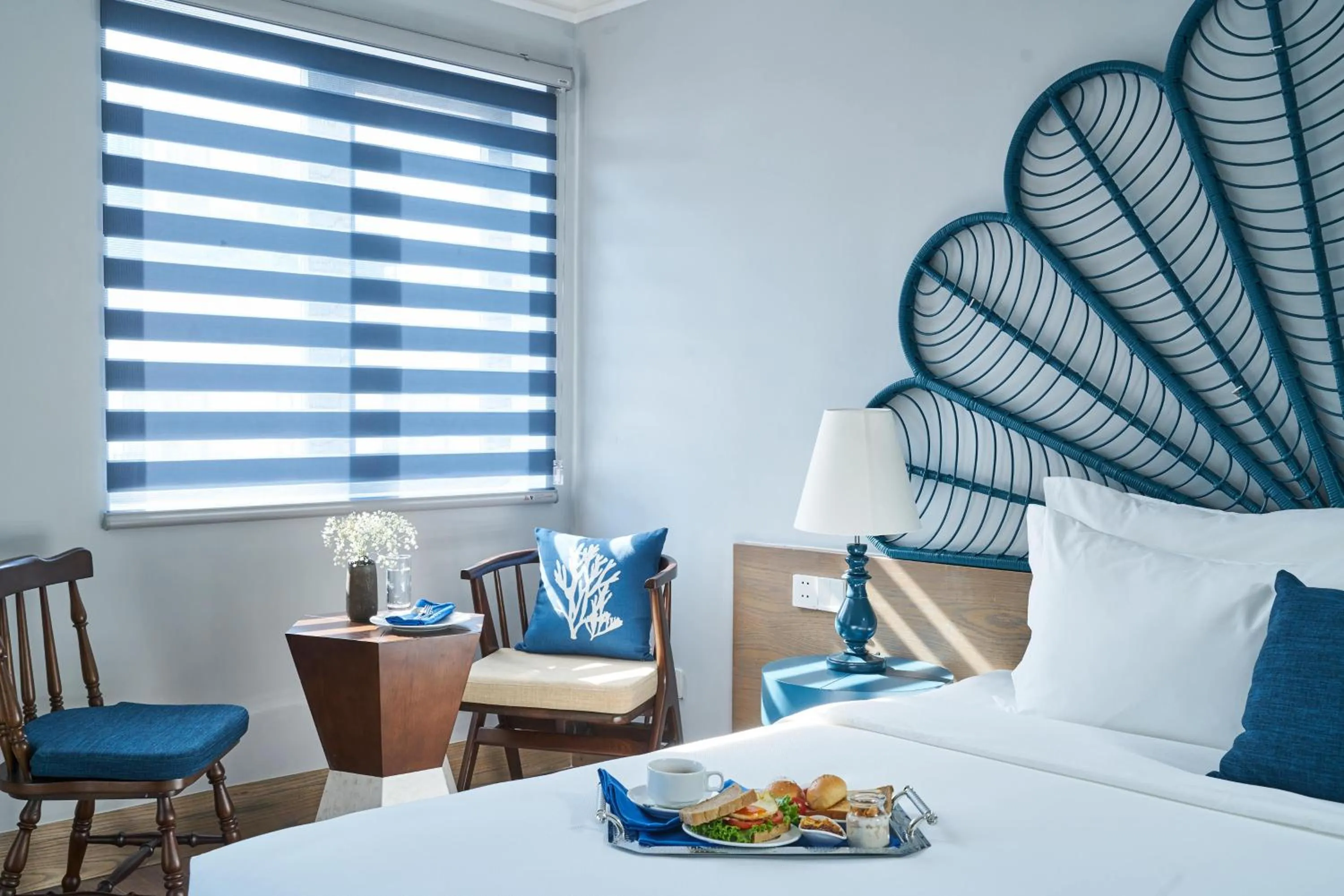 Seating area, Bed in Sofiana My Khe Hotel & Spa - Rooftop Pool Bar - Free Craft Beer and 20 minute Spa per Room