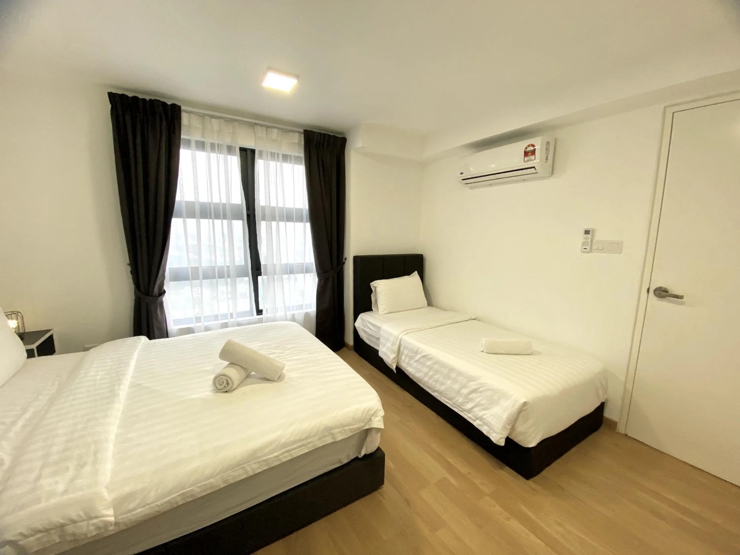 Bed in EkoCheras Suite by MOKA