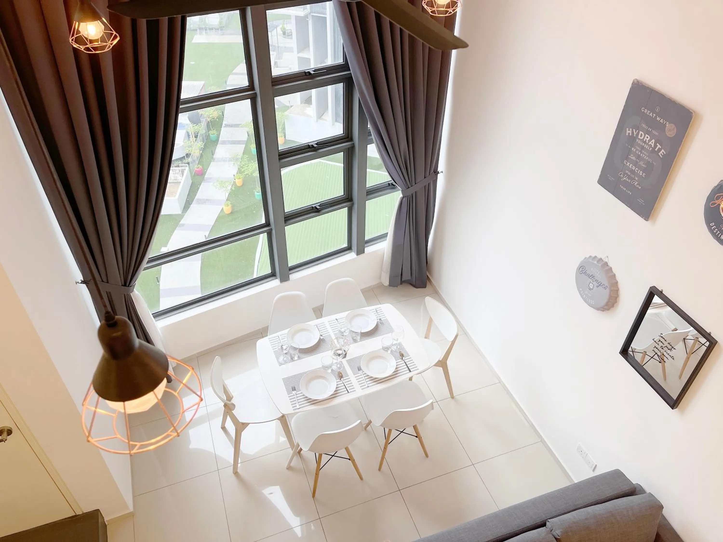 Dining area, Bed in EkoCheras Suite by MOKA